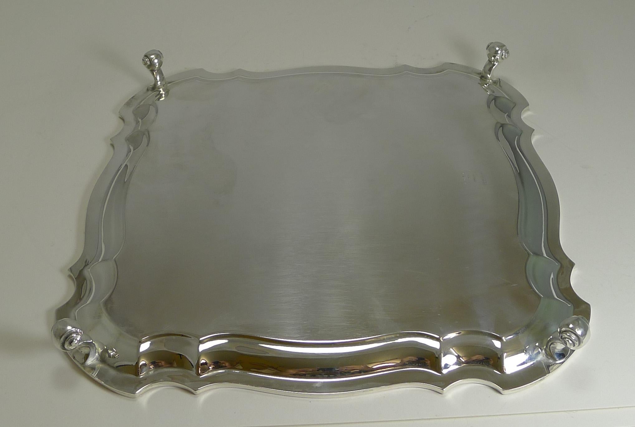 A fabulous square salver or tray with a wonderfully shaped border and standing on four attractive scrolled legs.

The underside is fully marked for C W Fletcher and Sons Ltd; it is also marked with the trade mark 