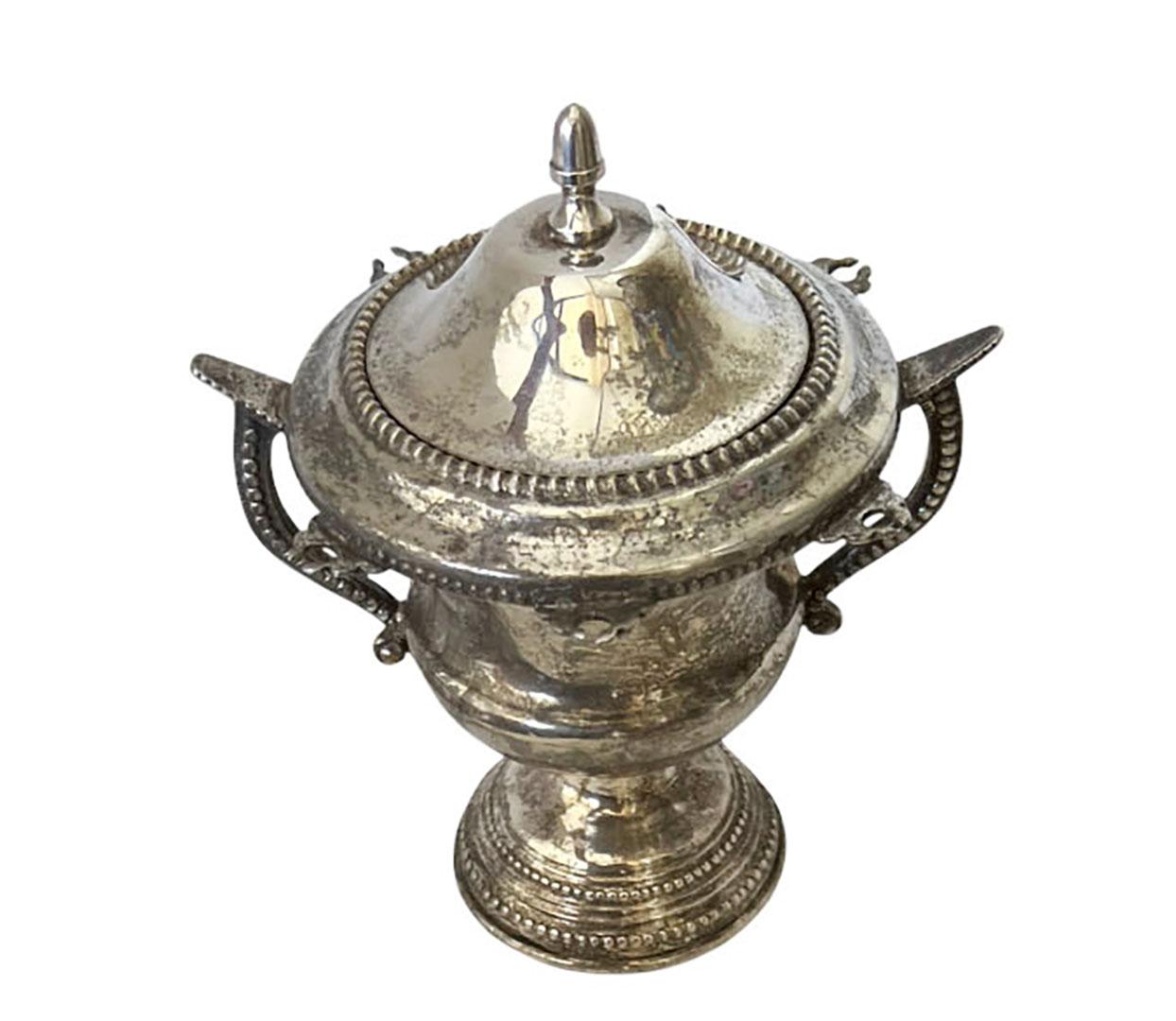antique silver sugar bowl with spoons