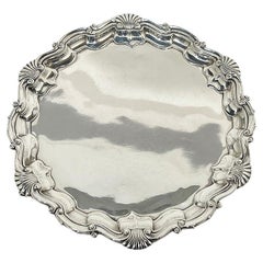 English silver tray, raised on three paw feet by Gibson and Langman, 1898