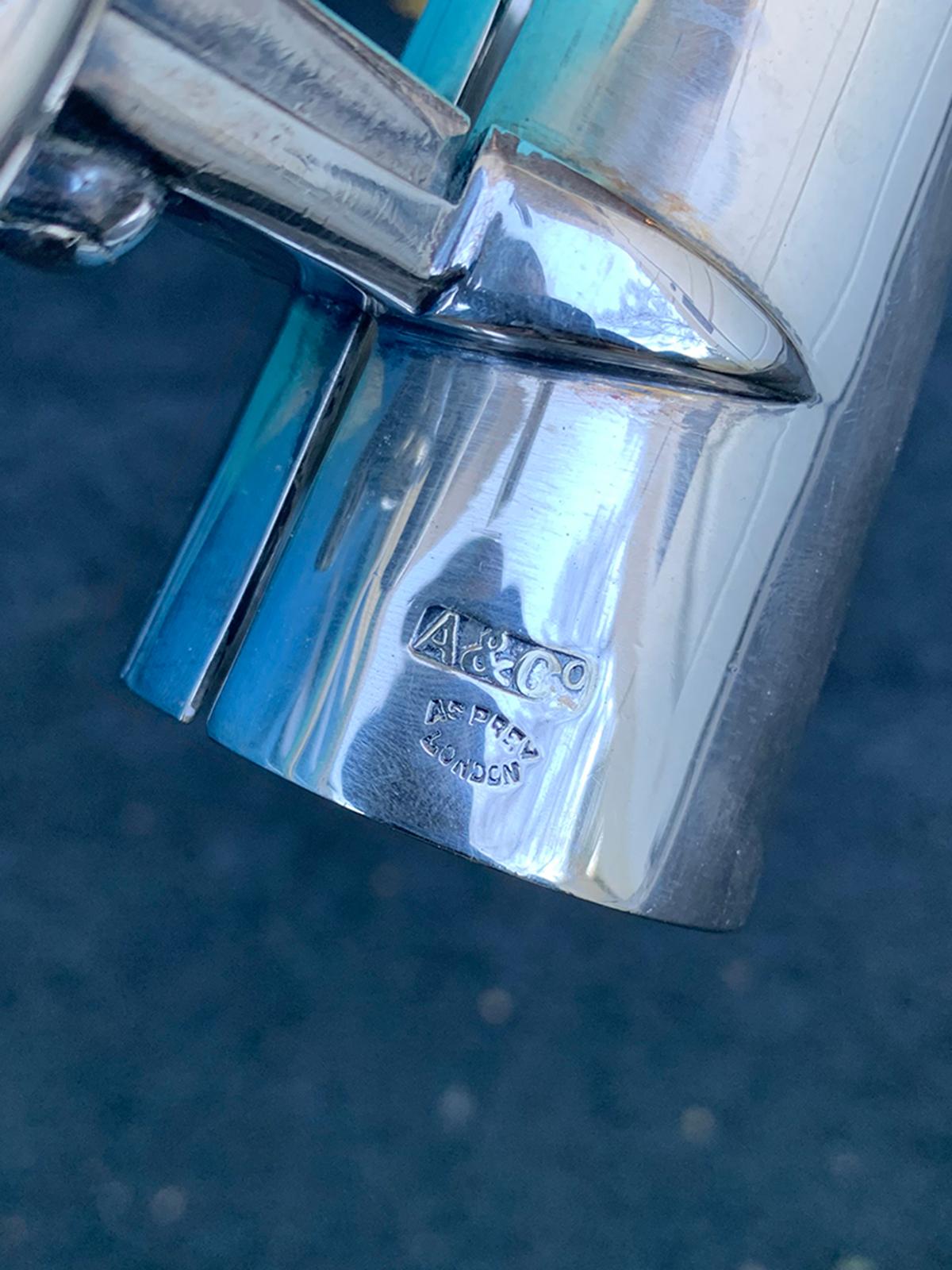Early 20th century English silverplate wine or champagne bottle handle/pourer by Asprey & Co. London, Marked.