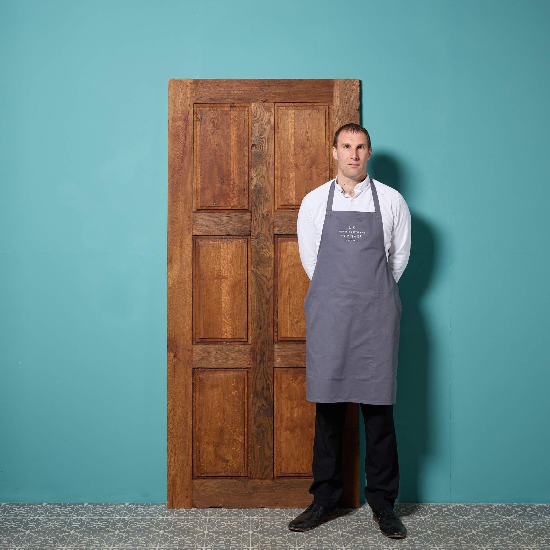 A French six panel reclaimed oak door, suitable for interior use. Made from antique oak timbers, this reclaimed door has a rustic look and stripped finish, ready for paint, stain or wax. It is a character feature for a home, looking stylish in