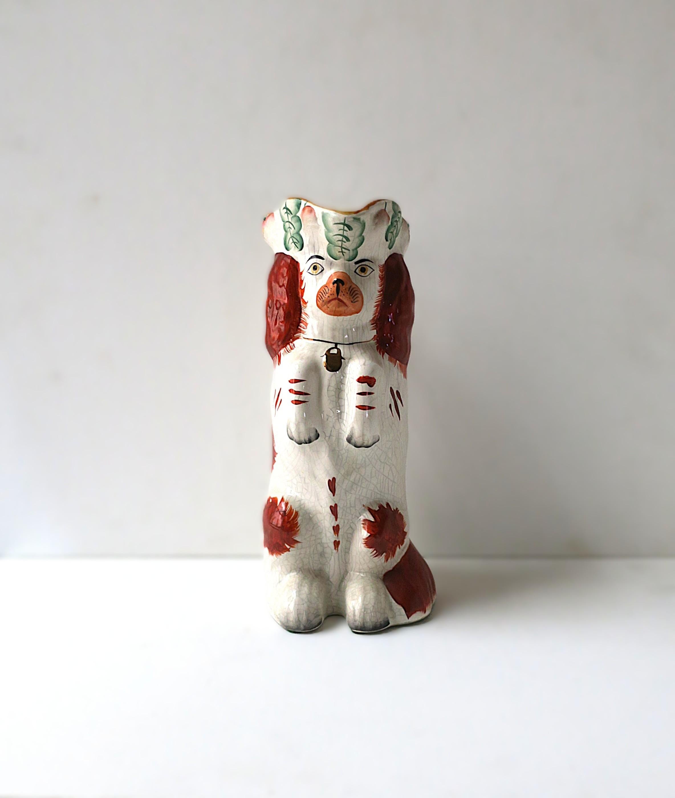 An English spaniel dog pitcher or vase hand-painted, in the Victorian style, circa mid-20th century, England. Beautiful details including gold collar with locket. Use as a standalone decorative object, with flowers, for water, etc. Very good