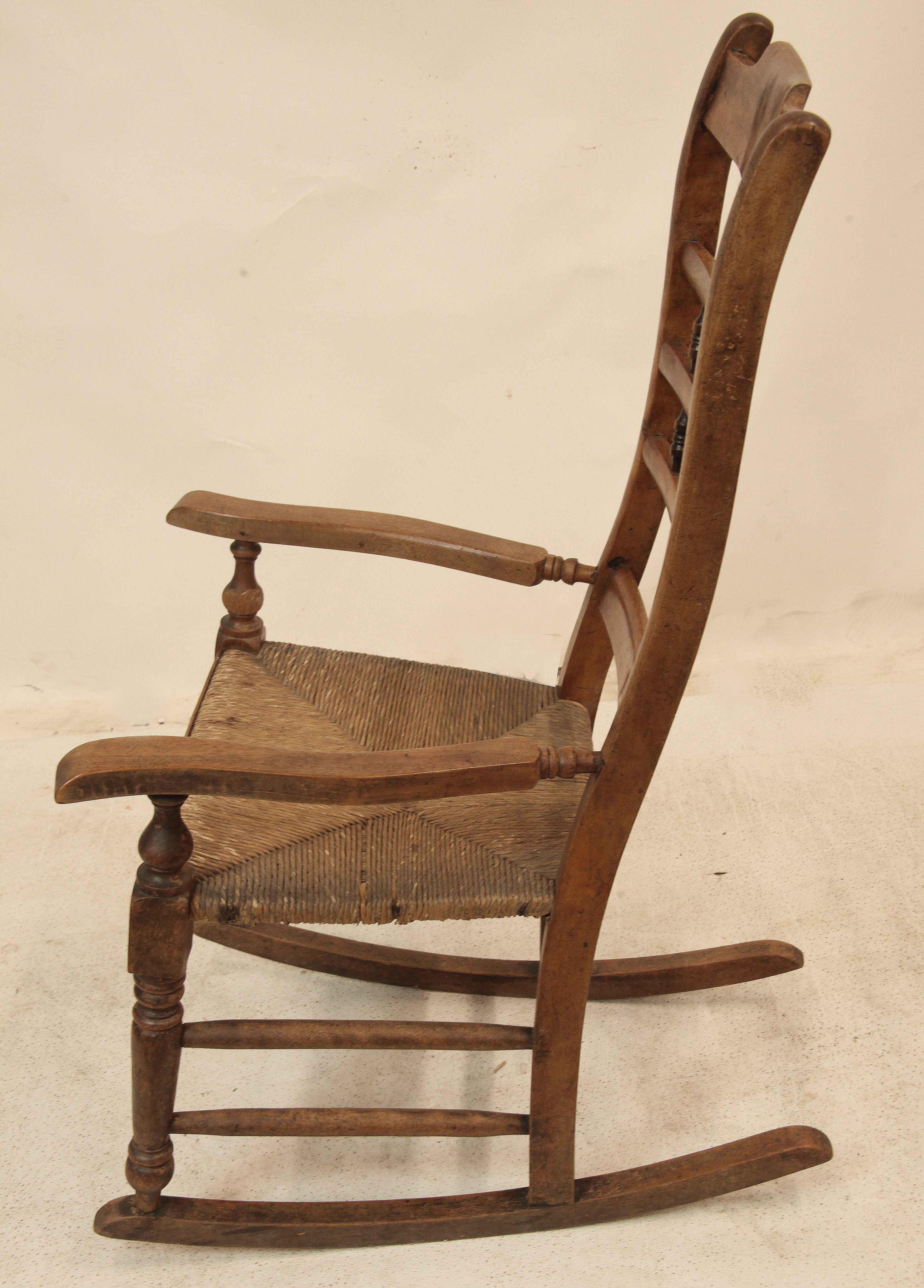 Turned English Spindle Back Rocking Chair For Sale