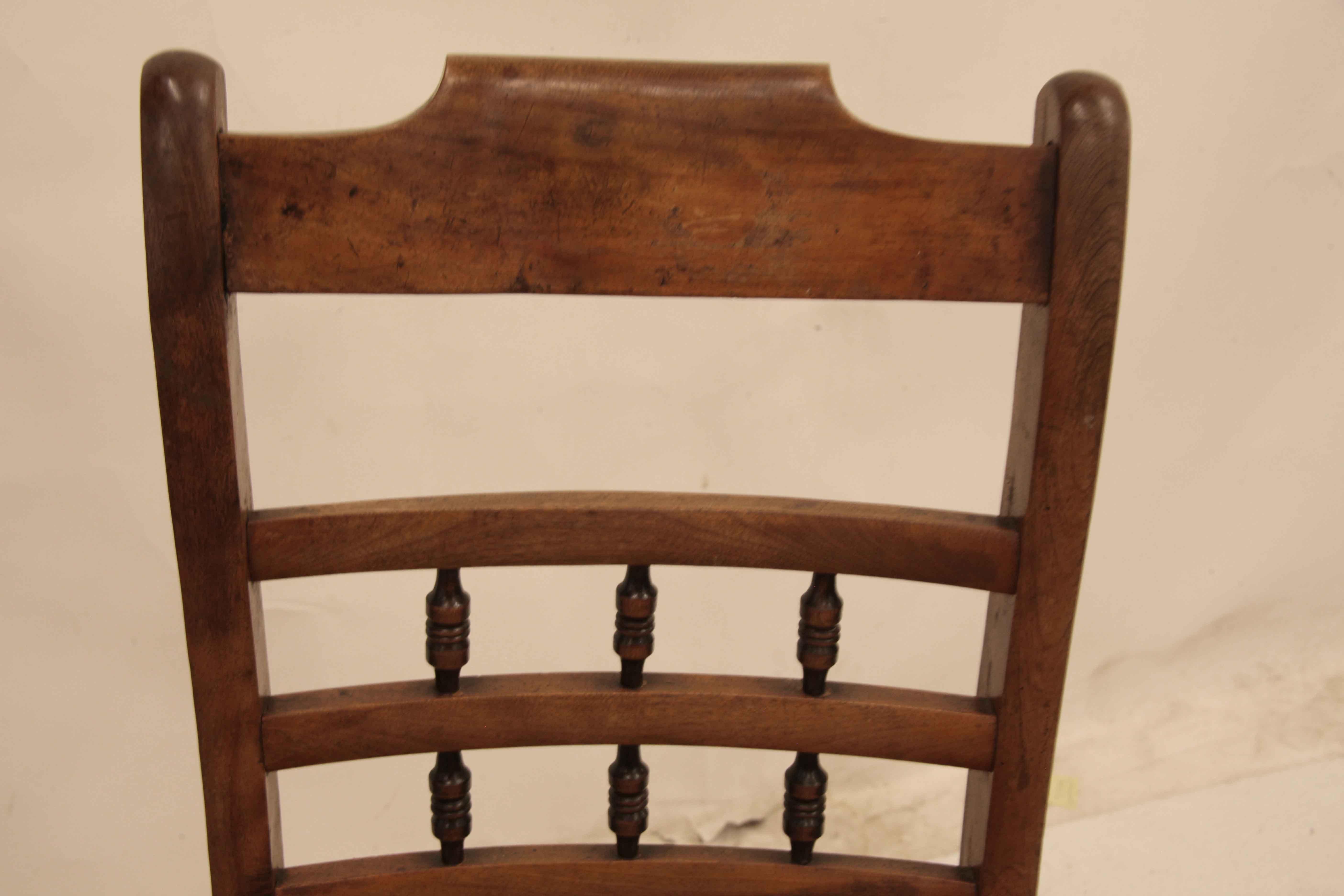 Mid-19th Century English Spindle Back Rocking Chair For Sale