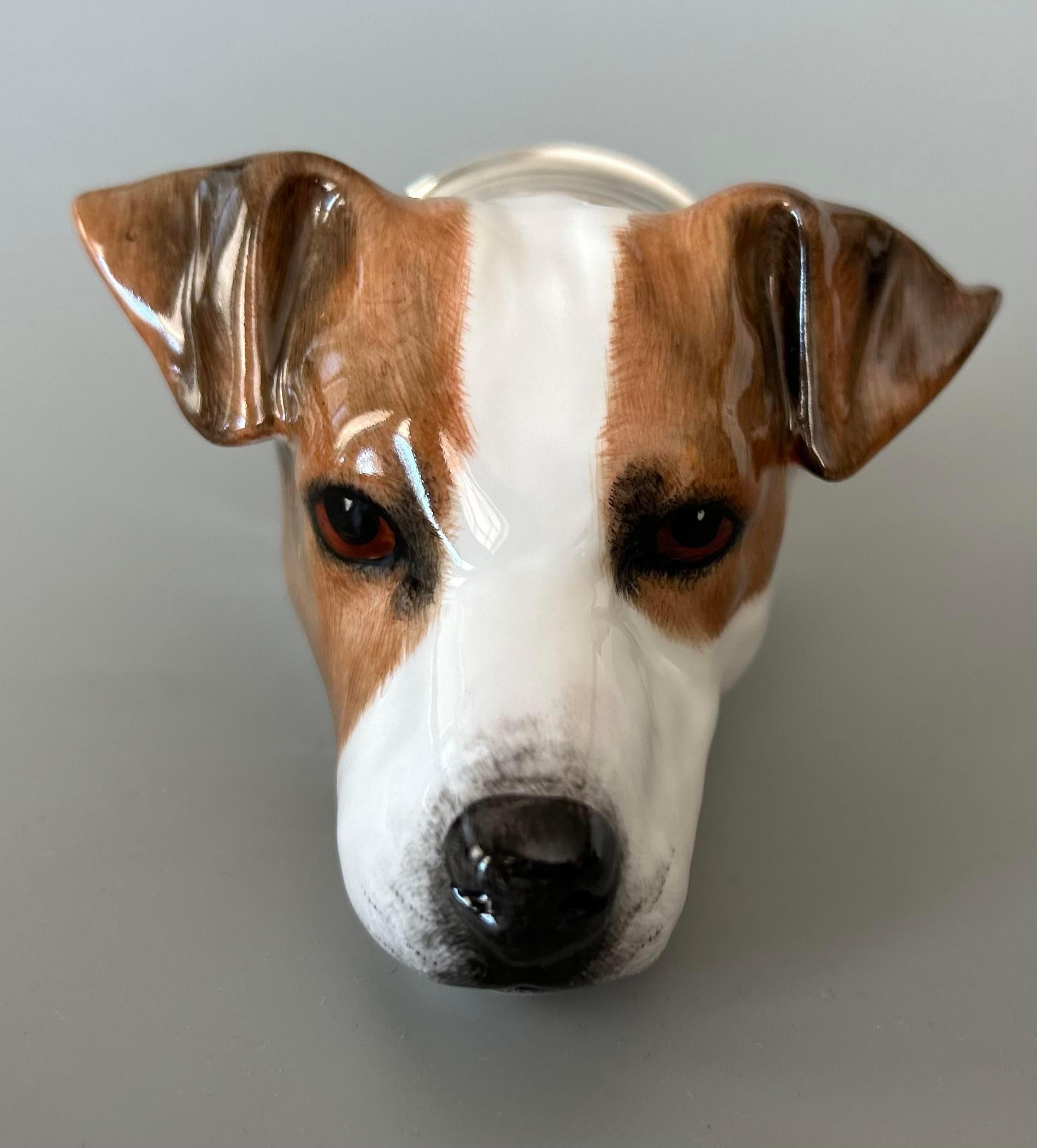 A fine rare vintage English Staffordshire Jack Russell Terrier hunting dog porcelain stirrup cup produced by Royale Stratford, in England. Acquired from a collector's estate in England. This charming stirrup cup is in the form of a Jack Russell