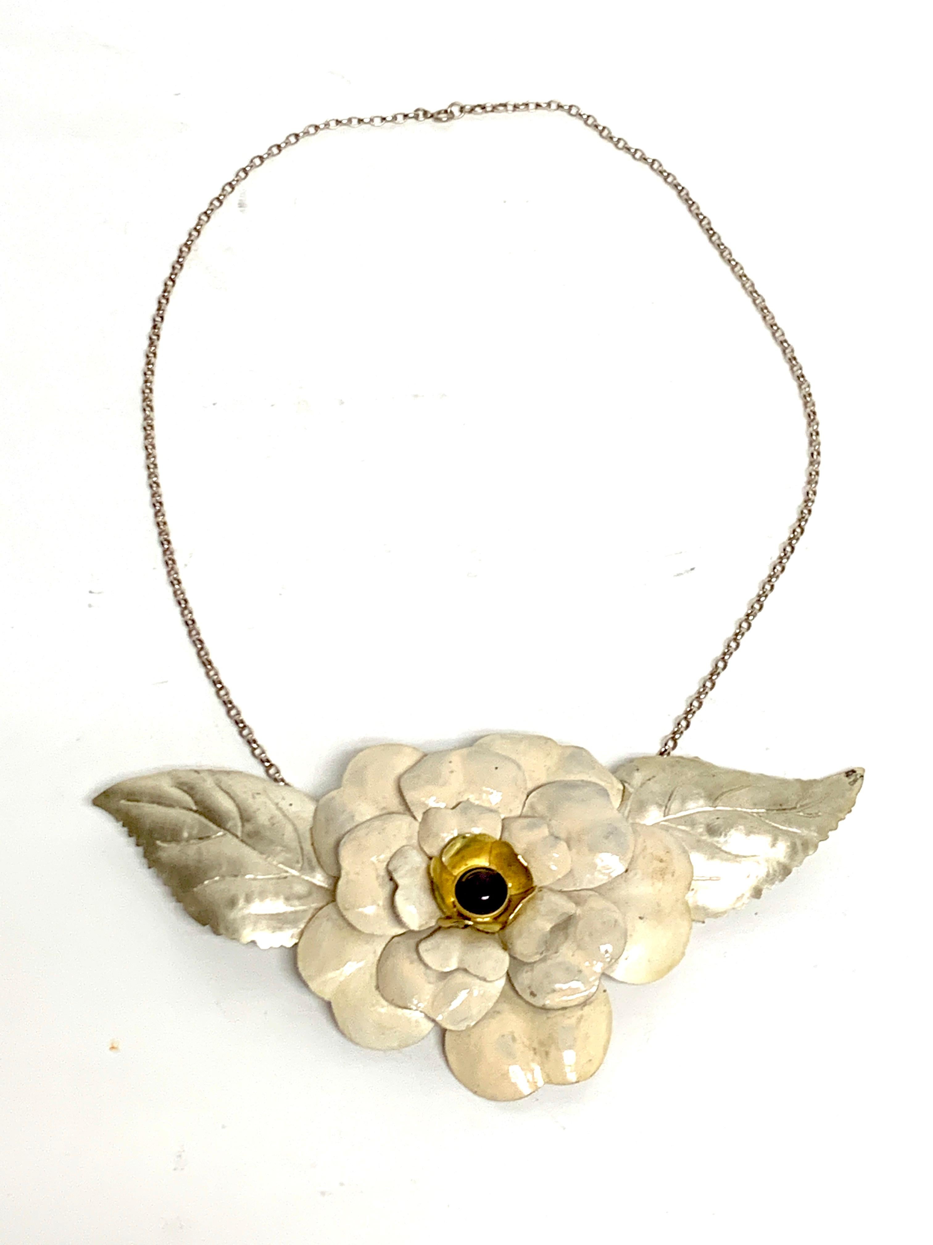 English Sterling & Enamel Flower Necklace, London, 1978

A beautiful English sterling silver and enamel flower necklace, made in London in 1978. This bold and beautiful piece features a striking combination of silver and white enamel, accented with