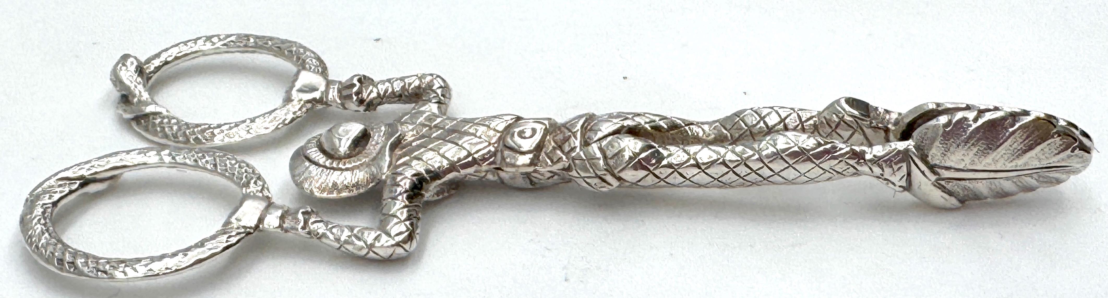 Cast English Sterling Jester & Ouroboros Snake Sugar Tongs, Birmingham 1887 For Sale