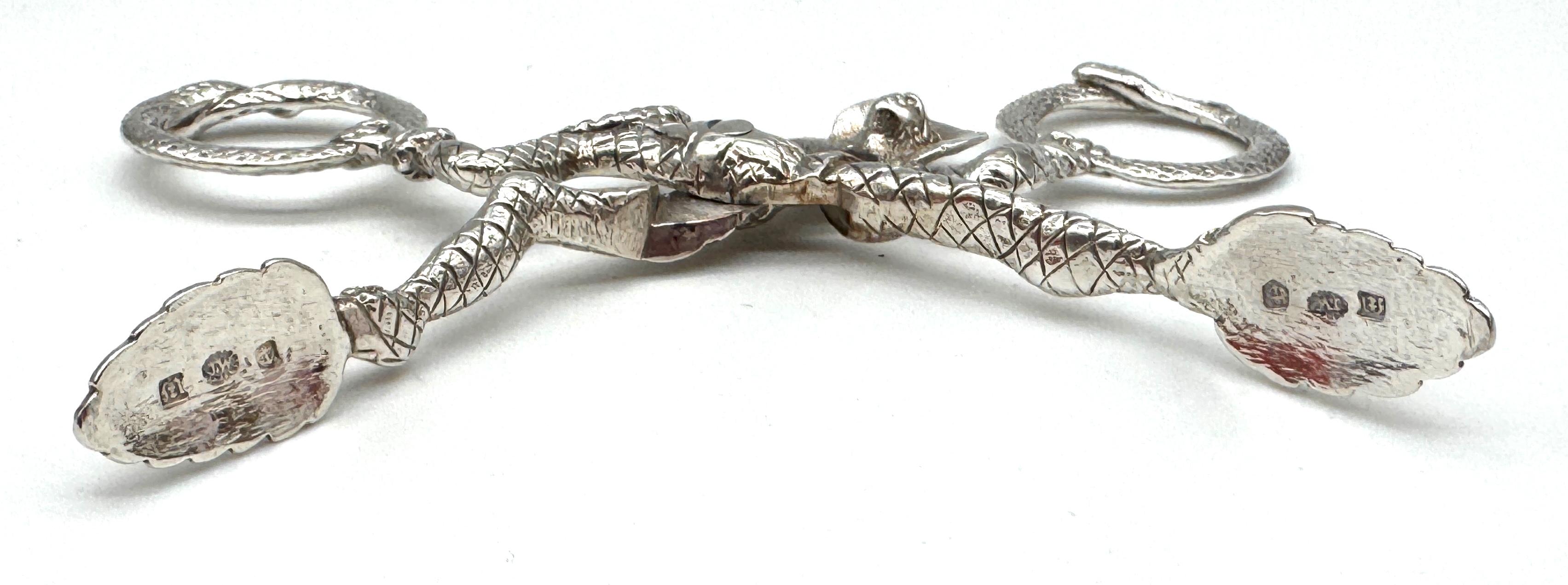 19th Century English Sterling Jester & Ouroboros Snake Sugar Tongs, Birmingham 1887 For Sale
