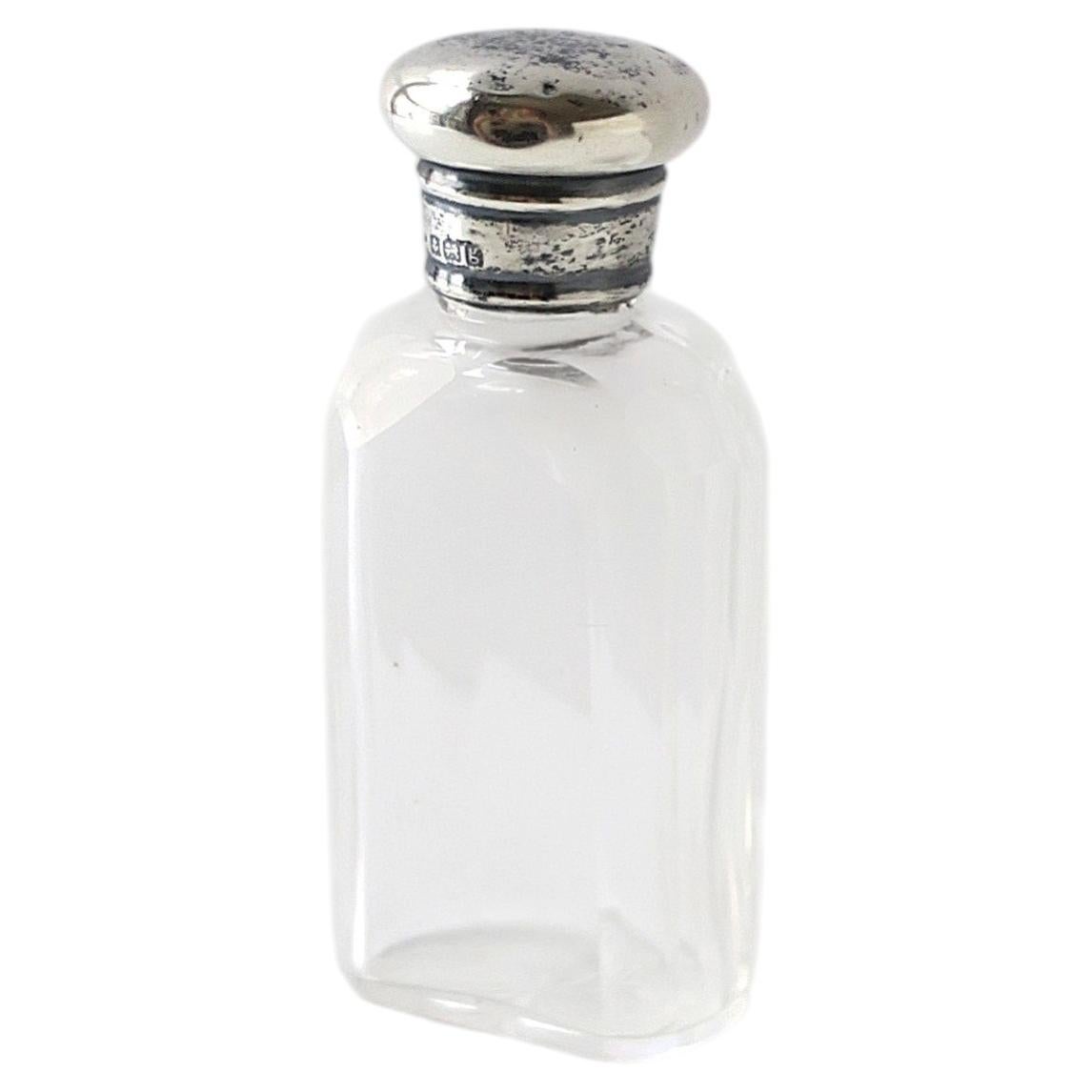 Bottiglia da profumo inglese in argento e cristallo, fine XIX secolo ca.