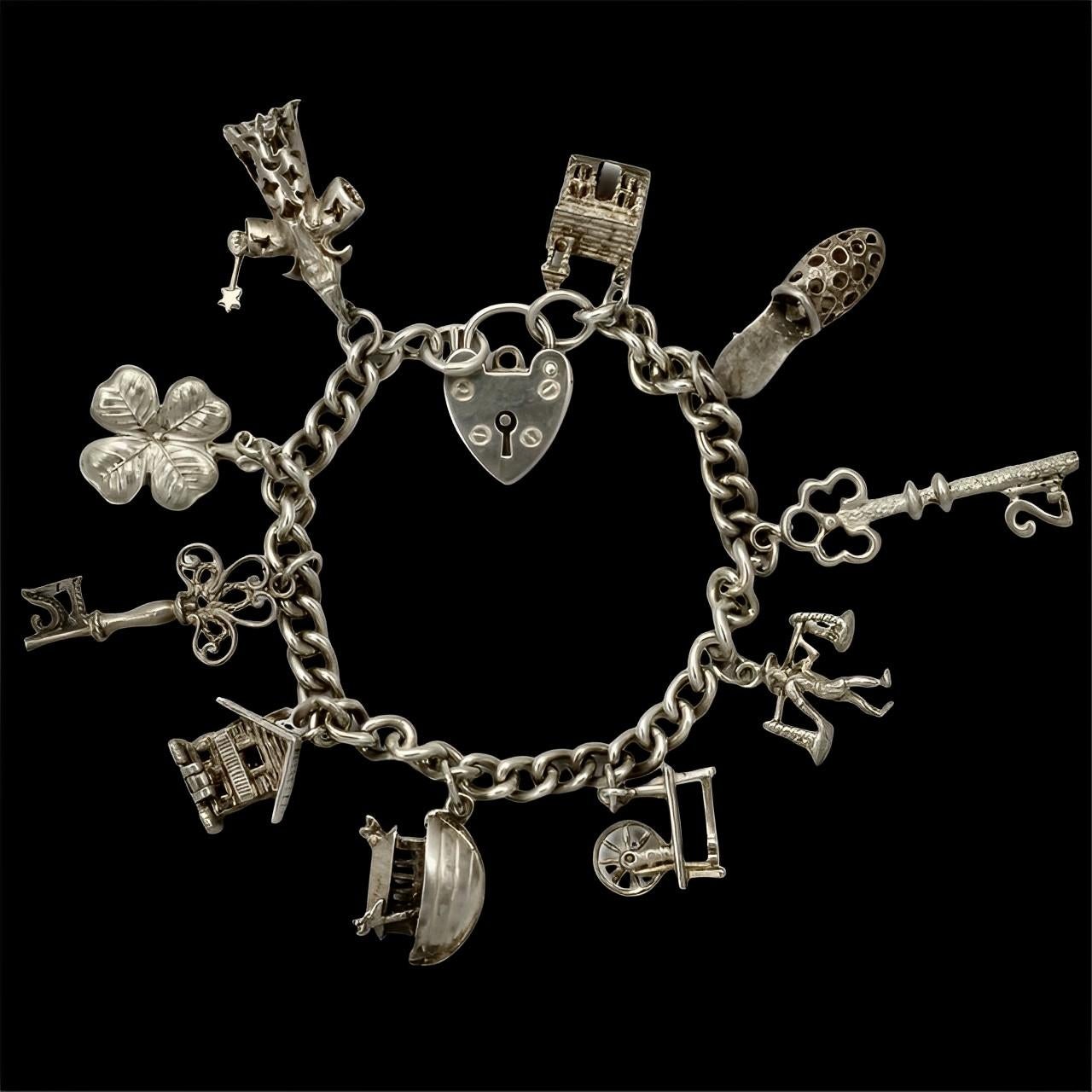 English Sterling Silver Charm Bracelet 1970s For Sale 6