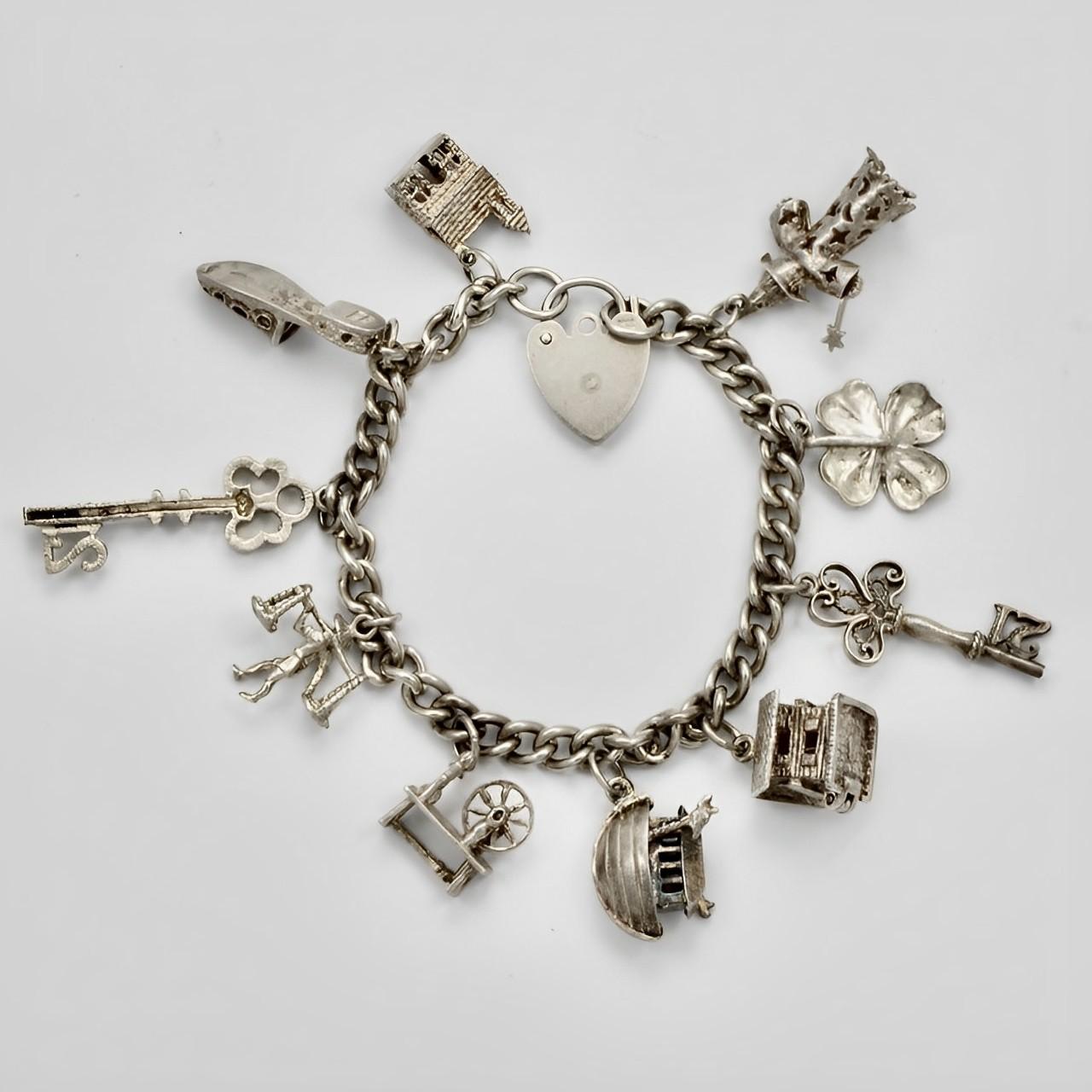 English Sterling Silver Charm Bracelet 1970s For Sale 2