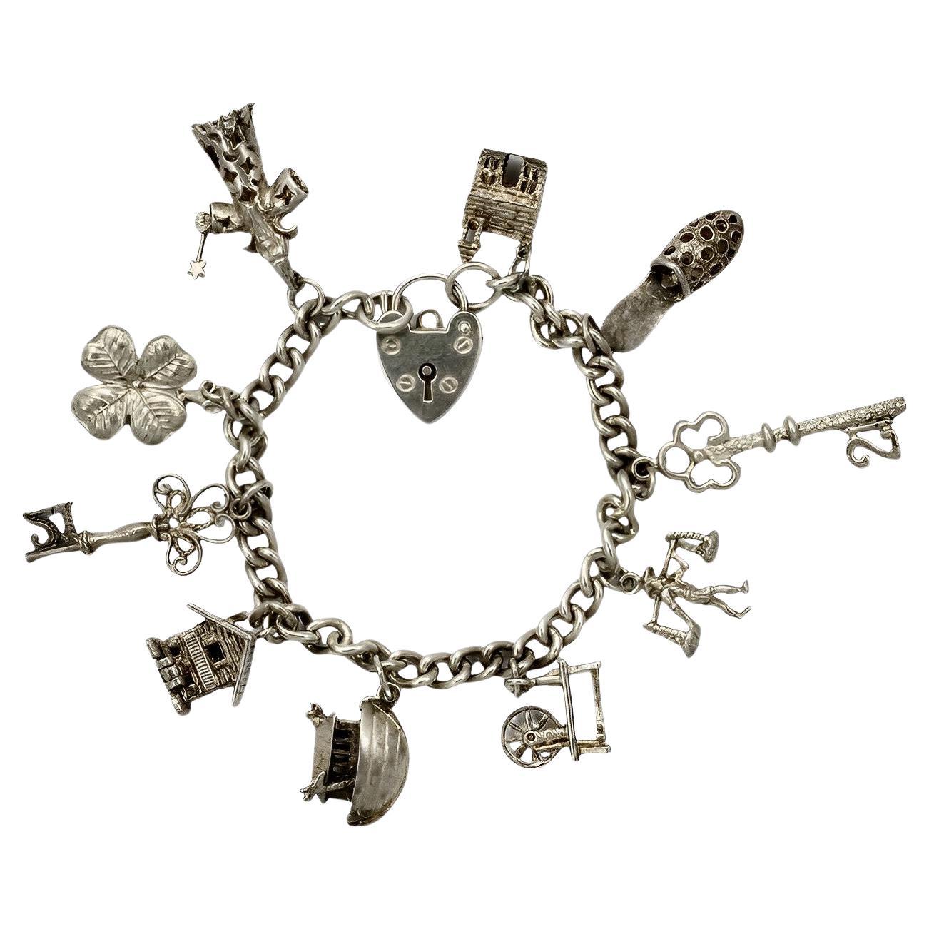 English Sterling Silver Charm Bracelet 1970s For Sale