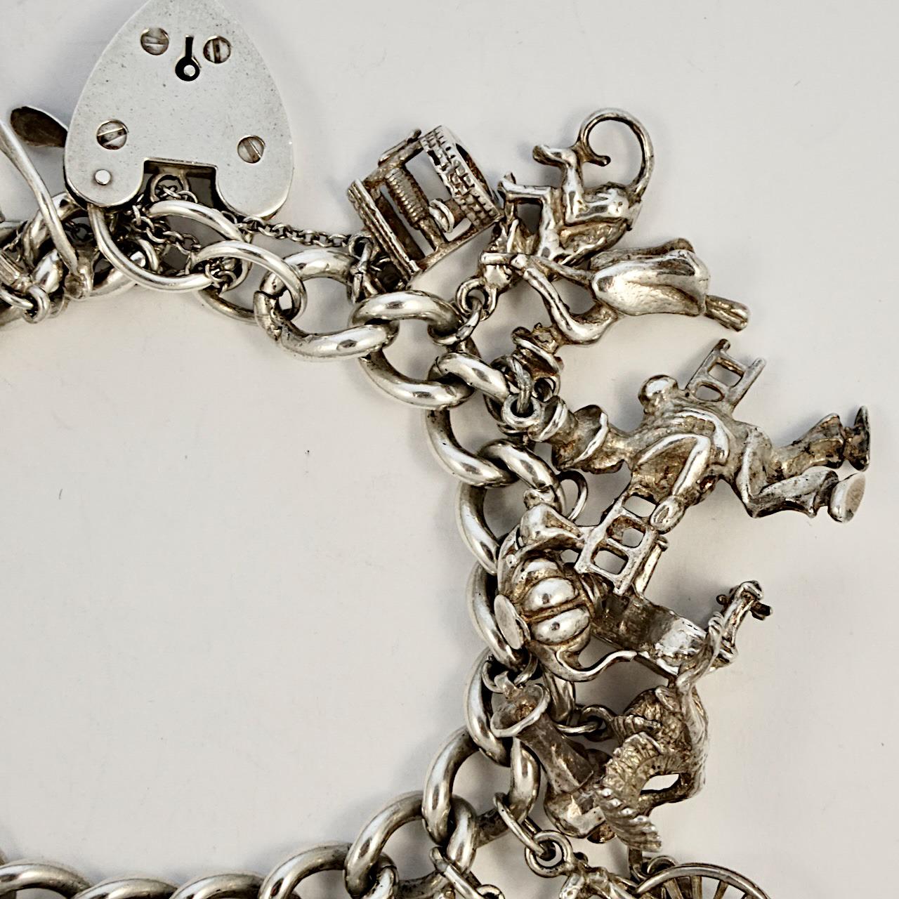 silver charm bracelet with heart clasp