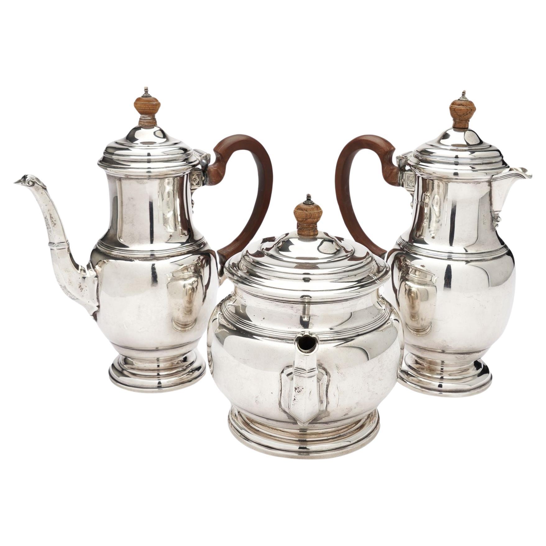 English sterling silver coffee, tea, and hot water pots by Mappin & Webb, 1929