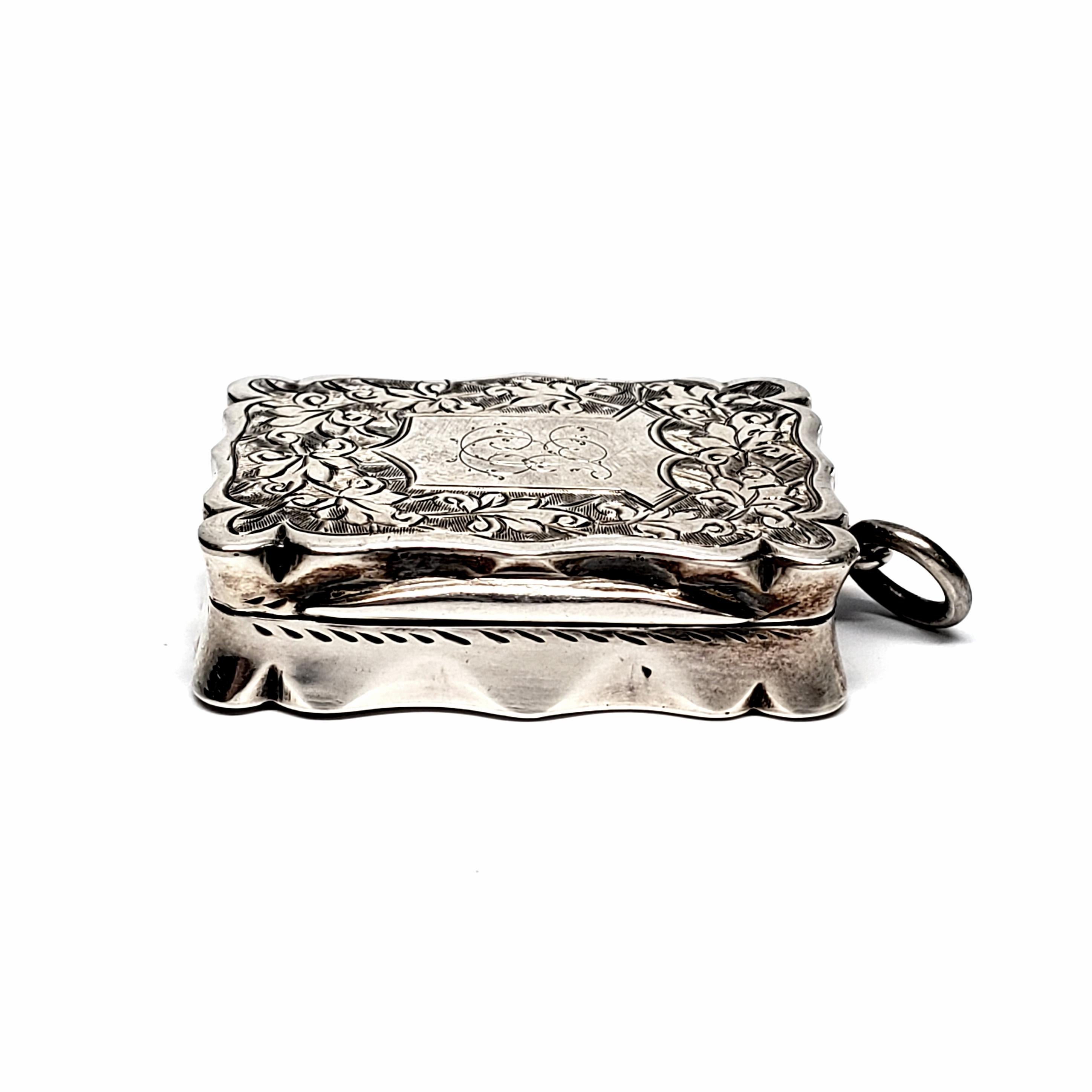 Antique sterling silver vinaigrette box by Colen Chesire, circa 1886.

This is a beautiful example of the small decorative boxes that were used to carry perfume and scents when traveling. The scent would be soaked into a sponge that would be