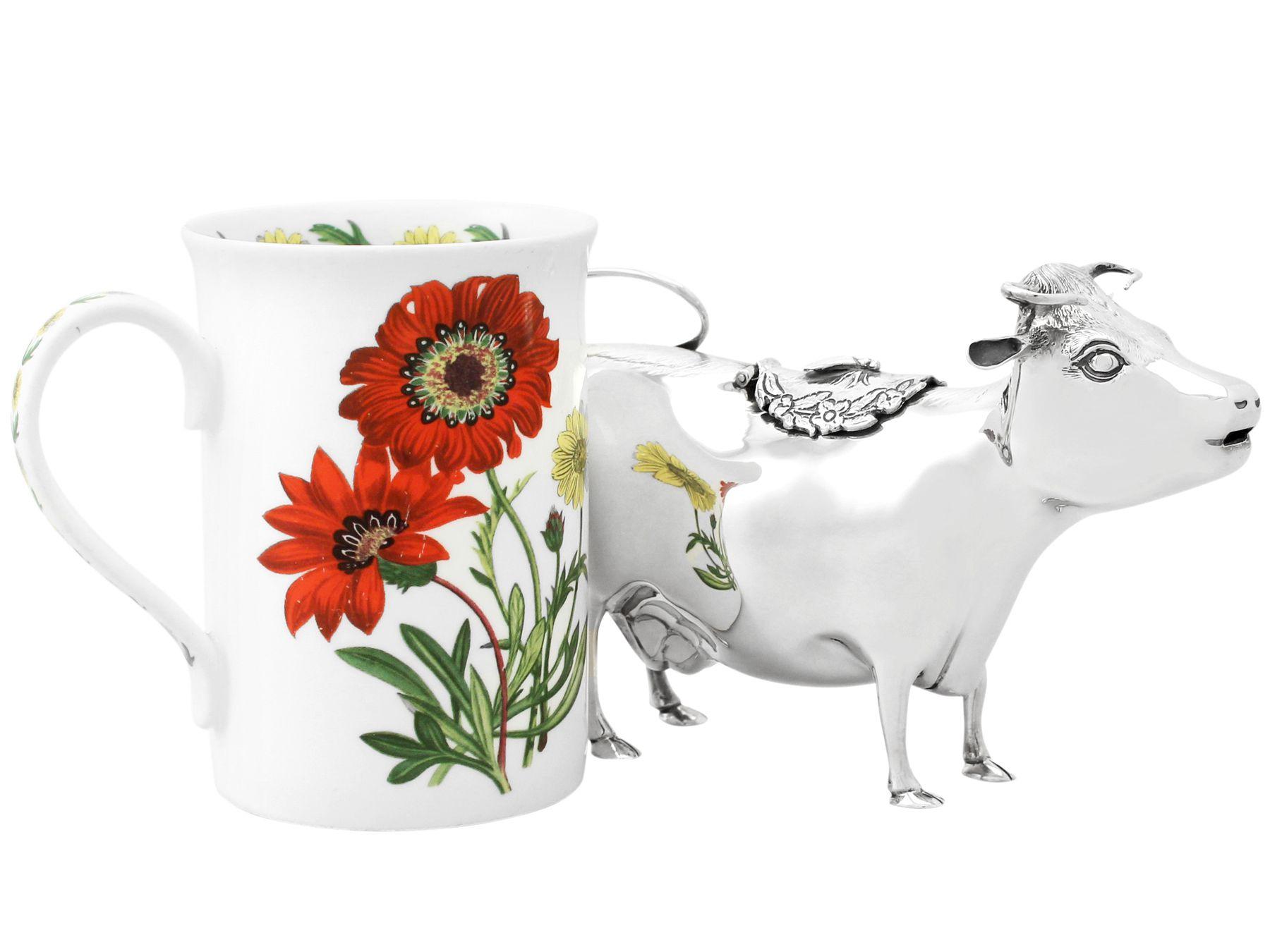 A fine and impressive vintage Elizabeth II English sterling silver cow creamer made in 18th century style; an addition to our silverware collection

This vintage Elizabeth II sterling silver cow creamer has been modelled in the style of an 18th