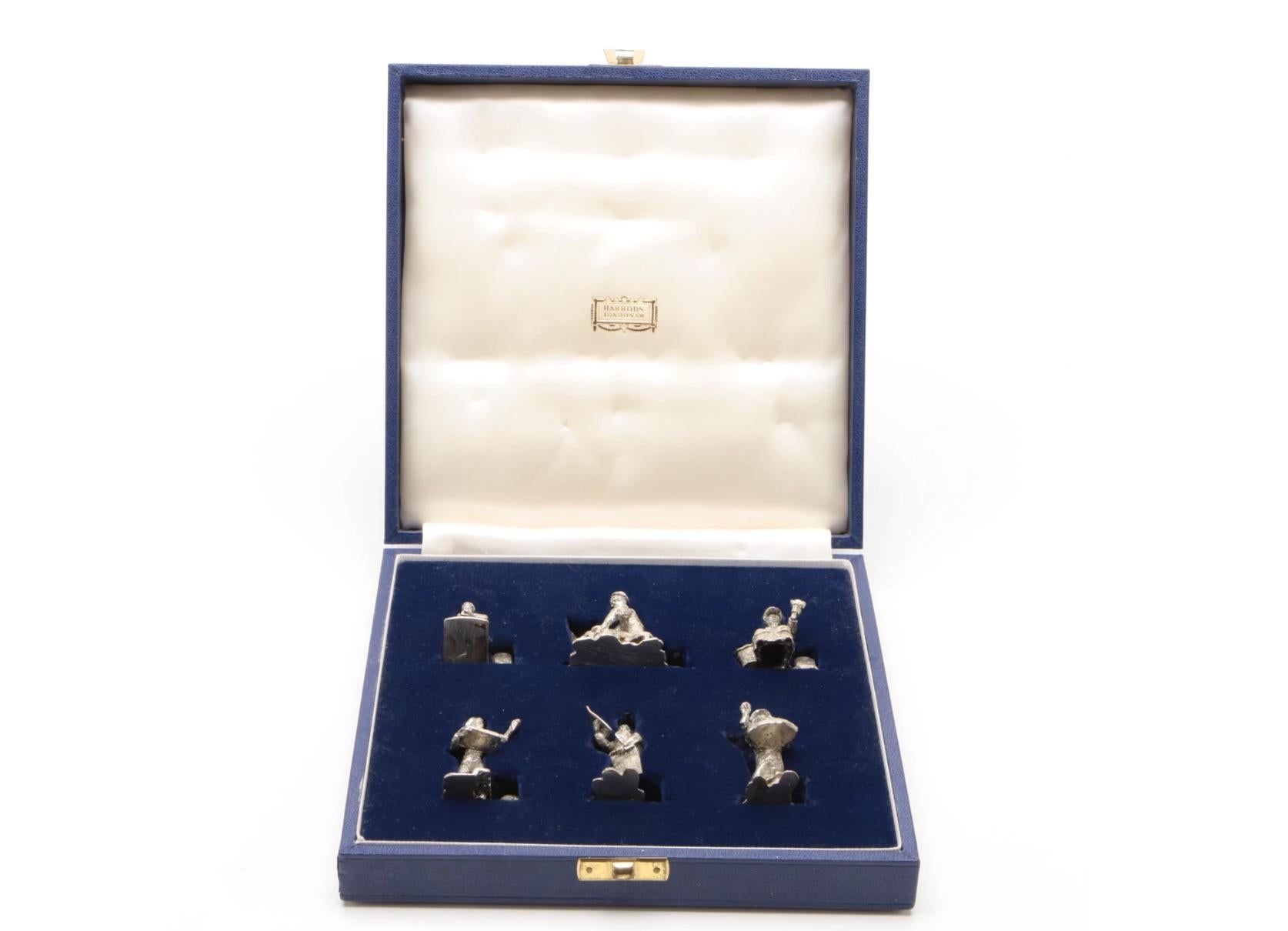 For your Highly Sophisticated Table Setting and Most Distinguished Guests!

An Exceptional, Fine, and impressive Set of 6 Vintage Elizabeth II English Sterling Silver Figural Menu / Place Card holders in a lovely Blue Harrods of London Presentation