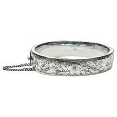 English Sterling Silver Flower Engraved Bangle Bracelet with Safety Chain 1960s