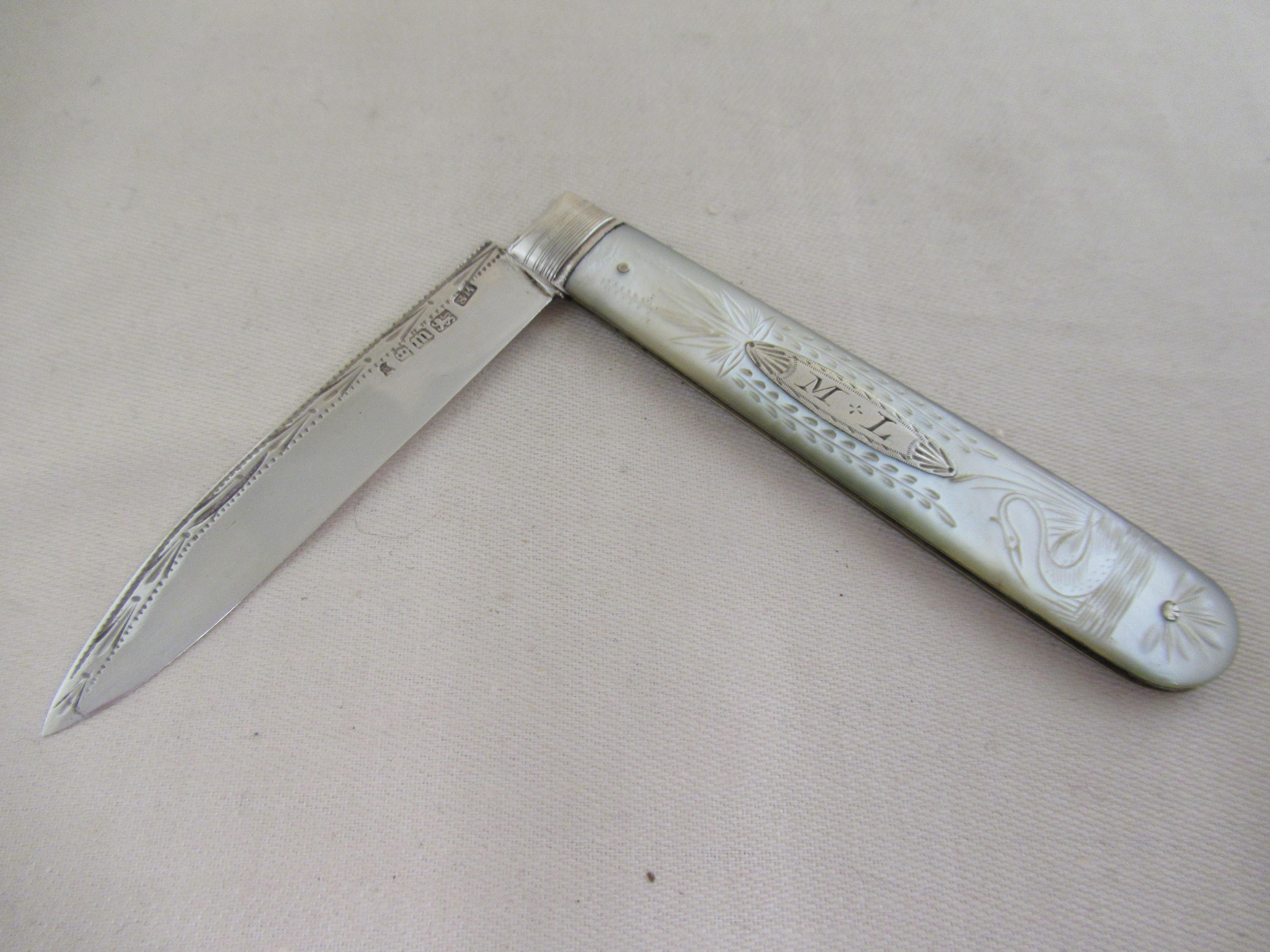 English sterling silver - a large FRUIT KNIFE, made in 1834
Full English hallmarks for Sheffield 1834 
The maker's mark is SK, which is probably Samuel Kirkby.
I have had `00s of fruit knives over the last 45 years, but this is the first time I