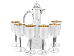 Jarra inglesa vintage de clarete de cristal montada en plata de ley y copas a juego