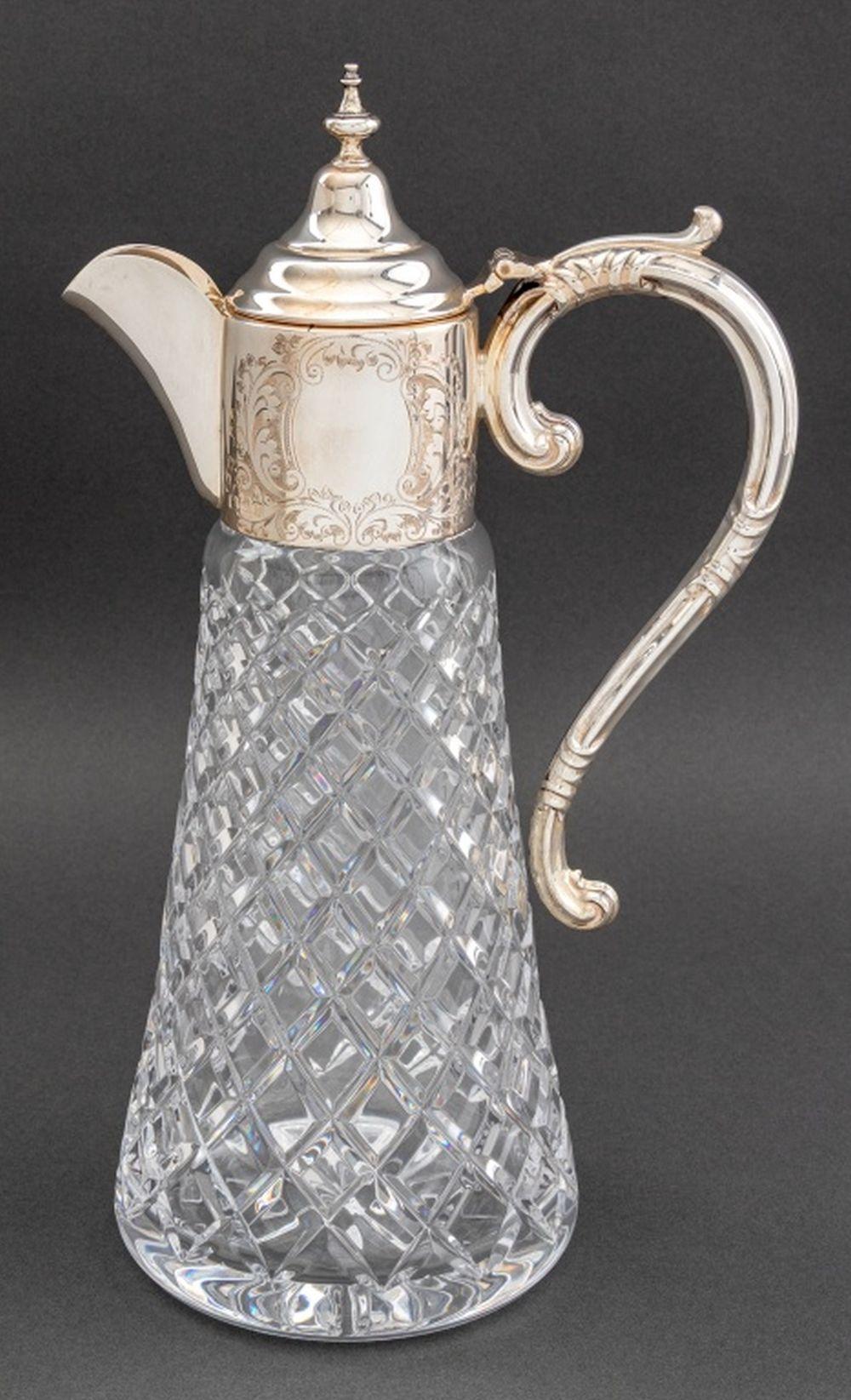 English Sterling Silver Mounted Glass Claret Jug, the hinged silver lid struck with marks for Mappin & Webb, Birmingham, 1987. Silver not weighable. 12.75