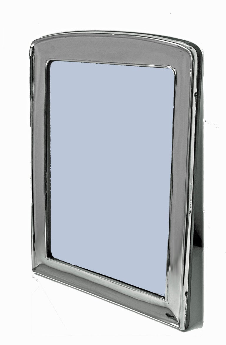 English sterling silver photograph frame Birmingham 1926 William Hutton. Plain rectangular form, original wood back. Measures: 10.25 x 9.7 inches. Image size: 8 x 6 inches.