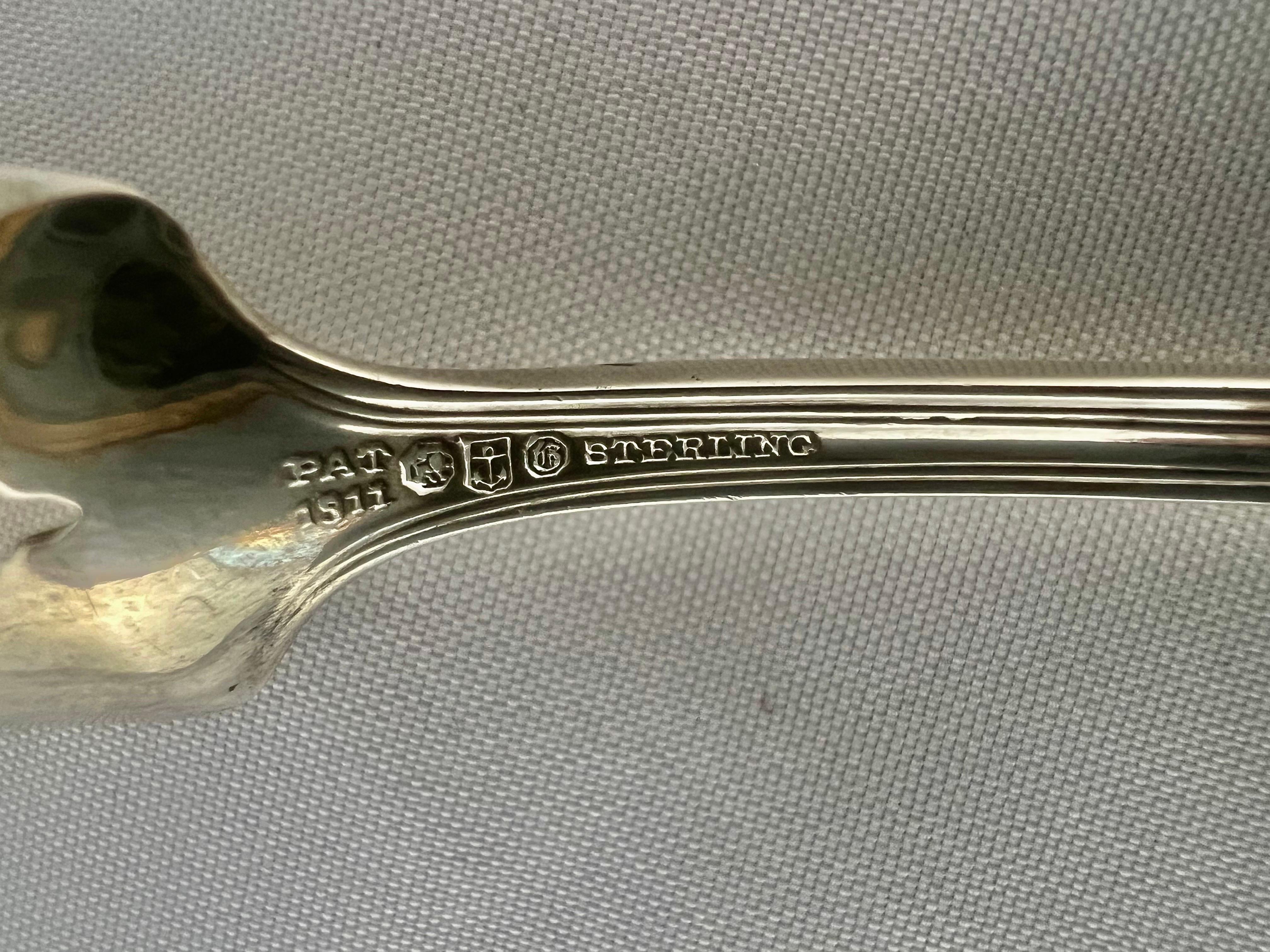 Early 20th Century English Sterling Silver Serving Spoon For Sale
