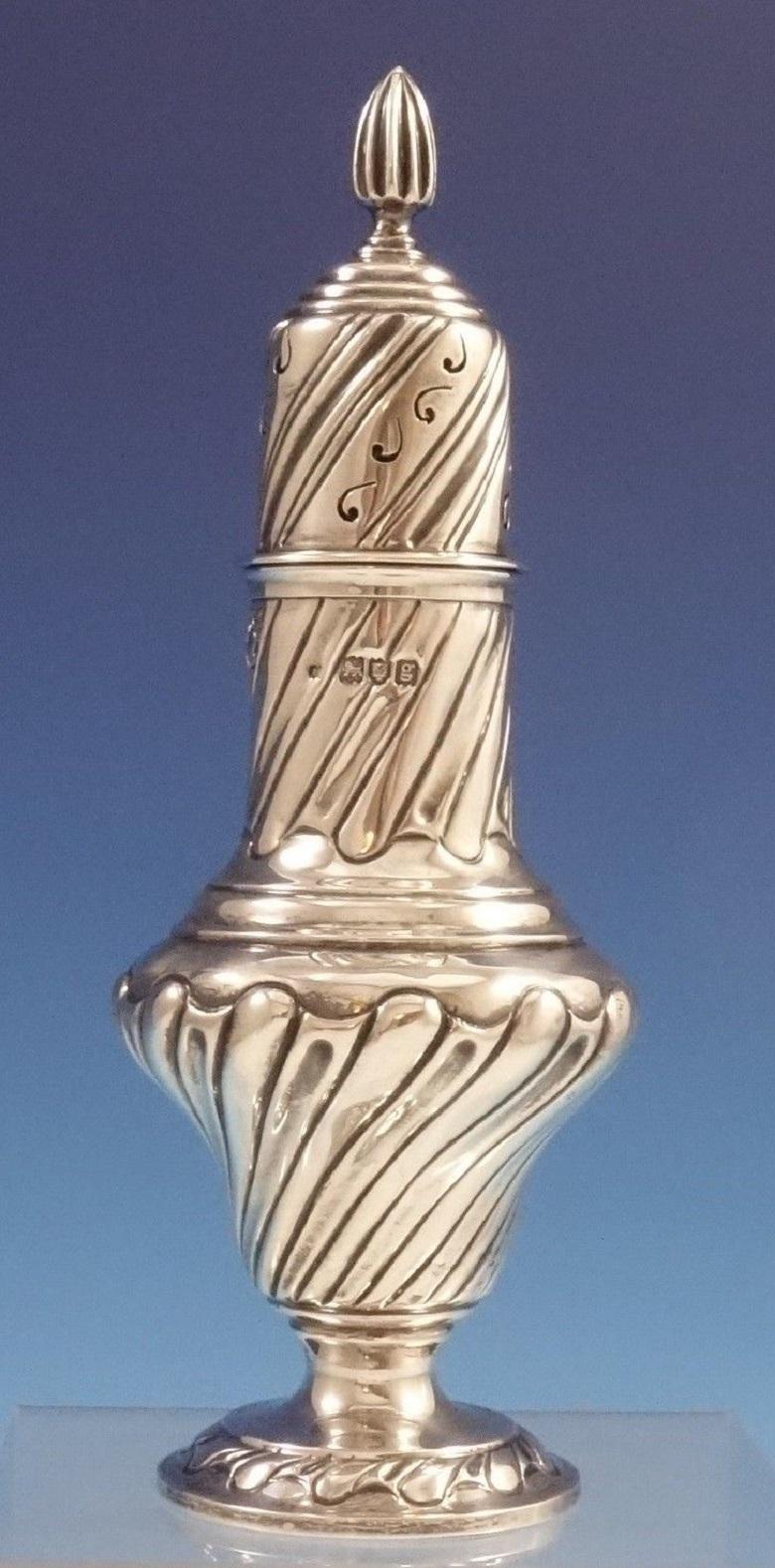 Lovely English sterling silver sugar shaker made in London in 1902. This piece measures 9 tall x 2 1/2 and weighs 7.8 troy ounces. It is not monogrammed and is in excellent condition. Fabulous!