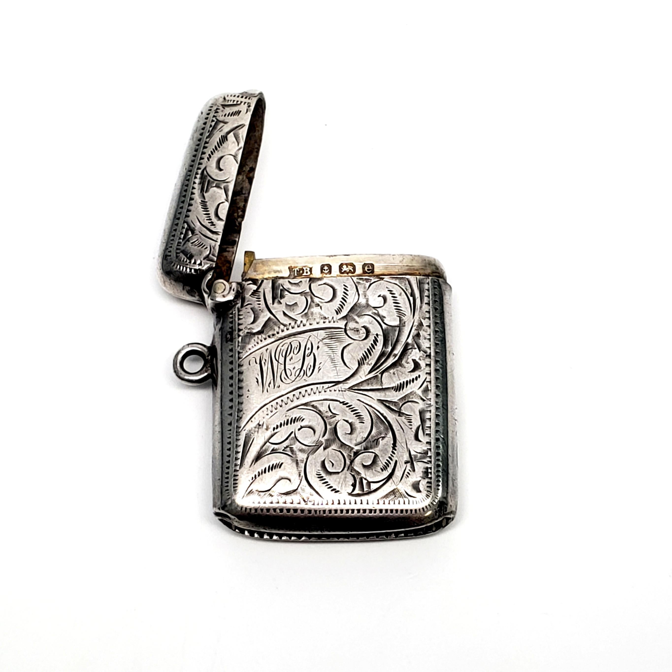 Antique English sterling silver match safe/vesta case by Thomas Bishton, with monogram, circa 1904.

This beautiful piece features an etched swirl design, and a loop on the side to attach to a chain. It has a well functioning hinge, and a striking