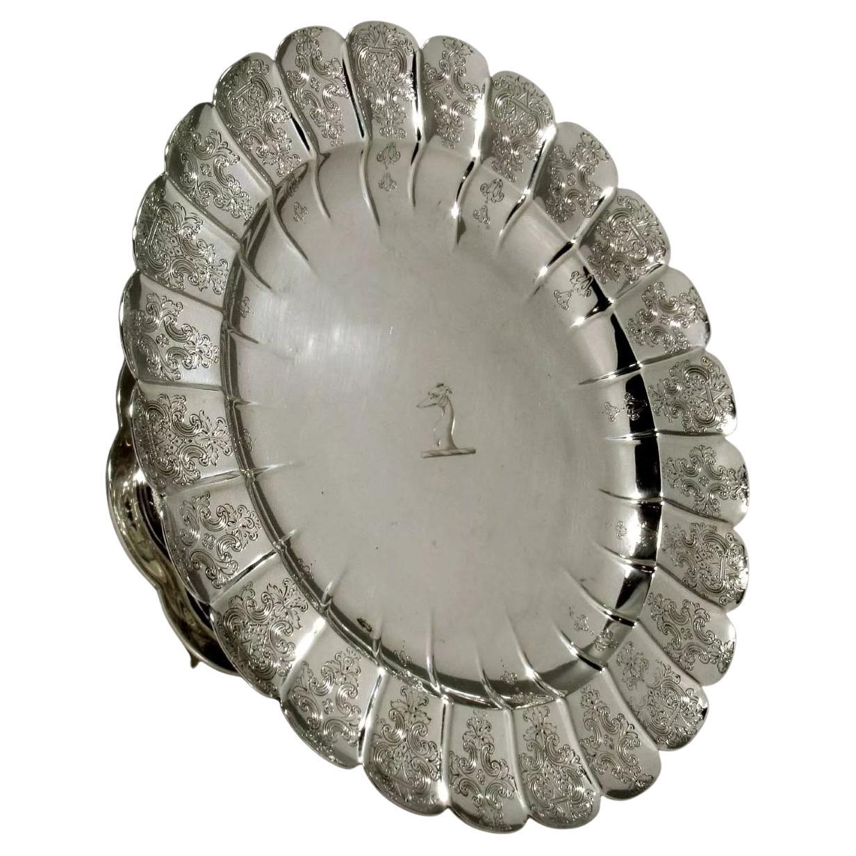 
               ENGLISH STERLING TAZZA Circa 1843 “ROBERT GARRARD”
                                             ROYAL SILVERSMITH
                                                         

An important 1843 English sterling silver hand