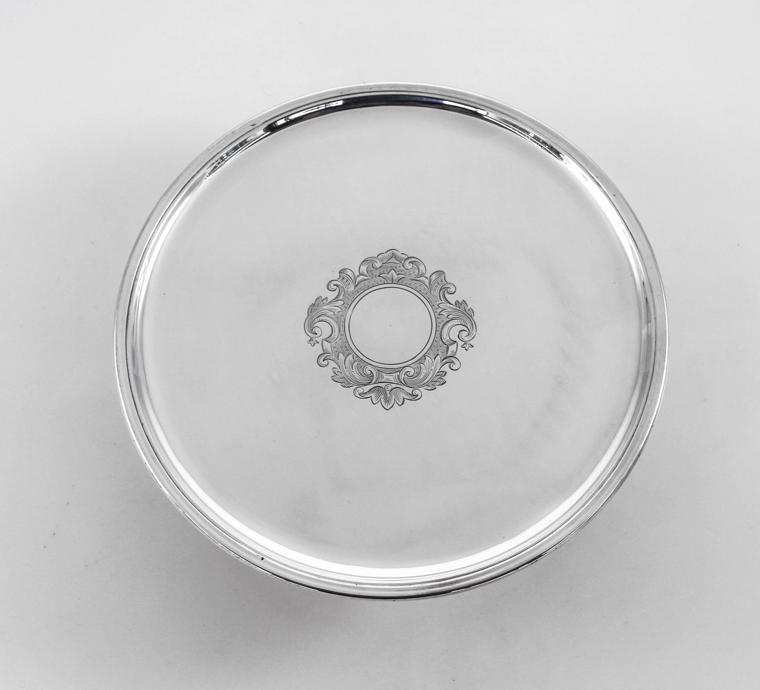 Proudly offering a pair of sterling silver tazzes by the English silversmith, Lionel Alfred Crichton of London. Unlike a compote, a tazz has a flat surface which makes it ideal for serving pastries or finger-food. They have a classic English design;