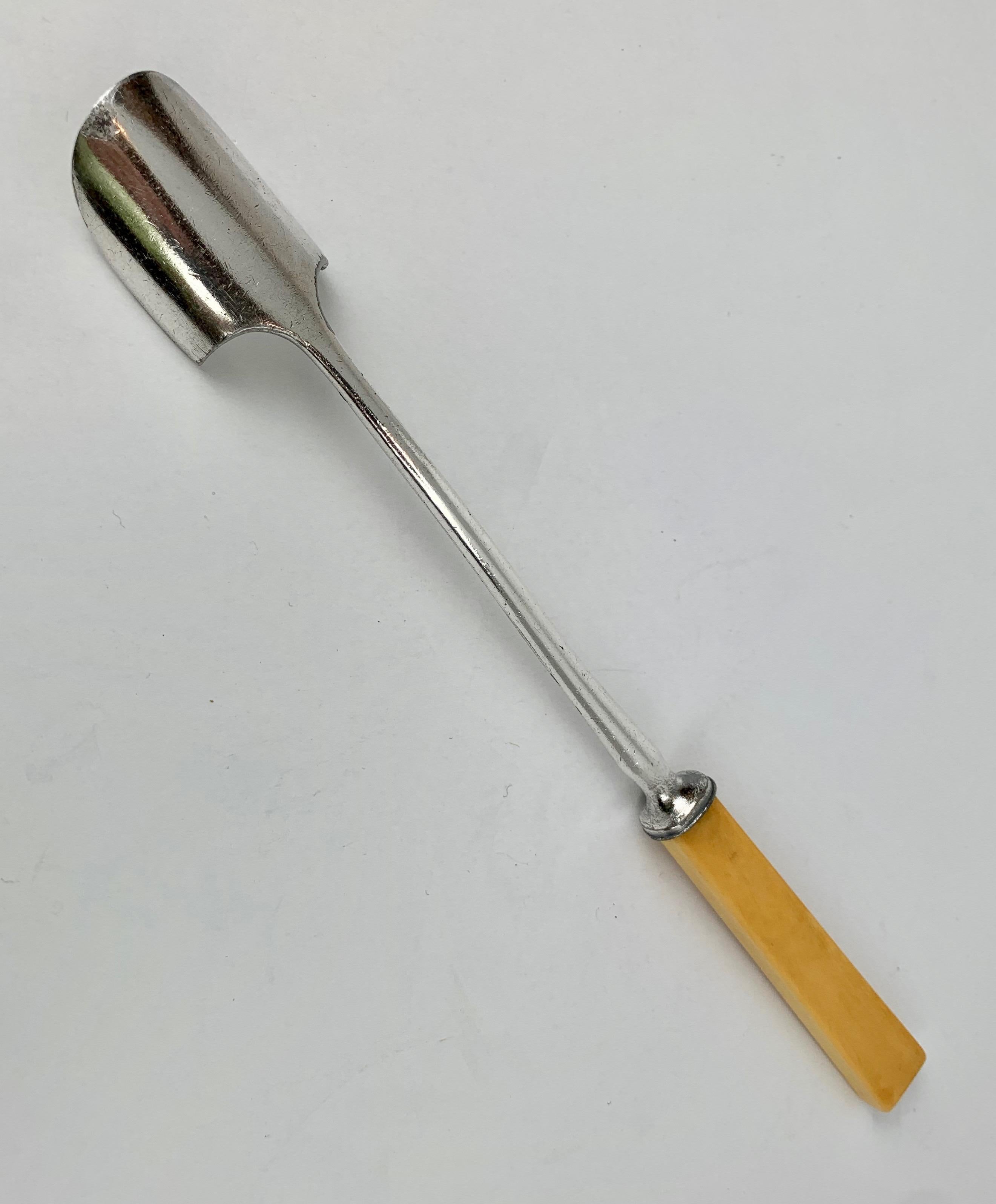 English Stilton cheese scoop in silver plate with a bone handle. There is slightwear to the silver, however, very usable.
This scoop can obviously be used for any soft to medium soft cheeses.
England, c. 1890
Length-9.75