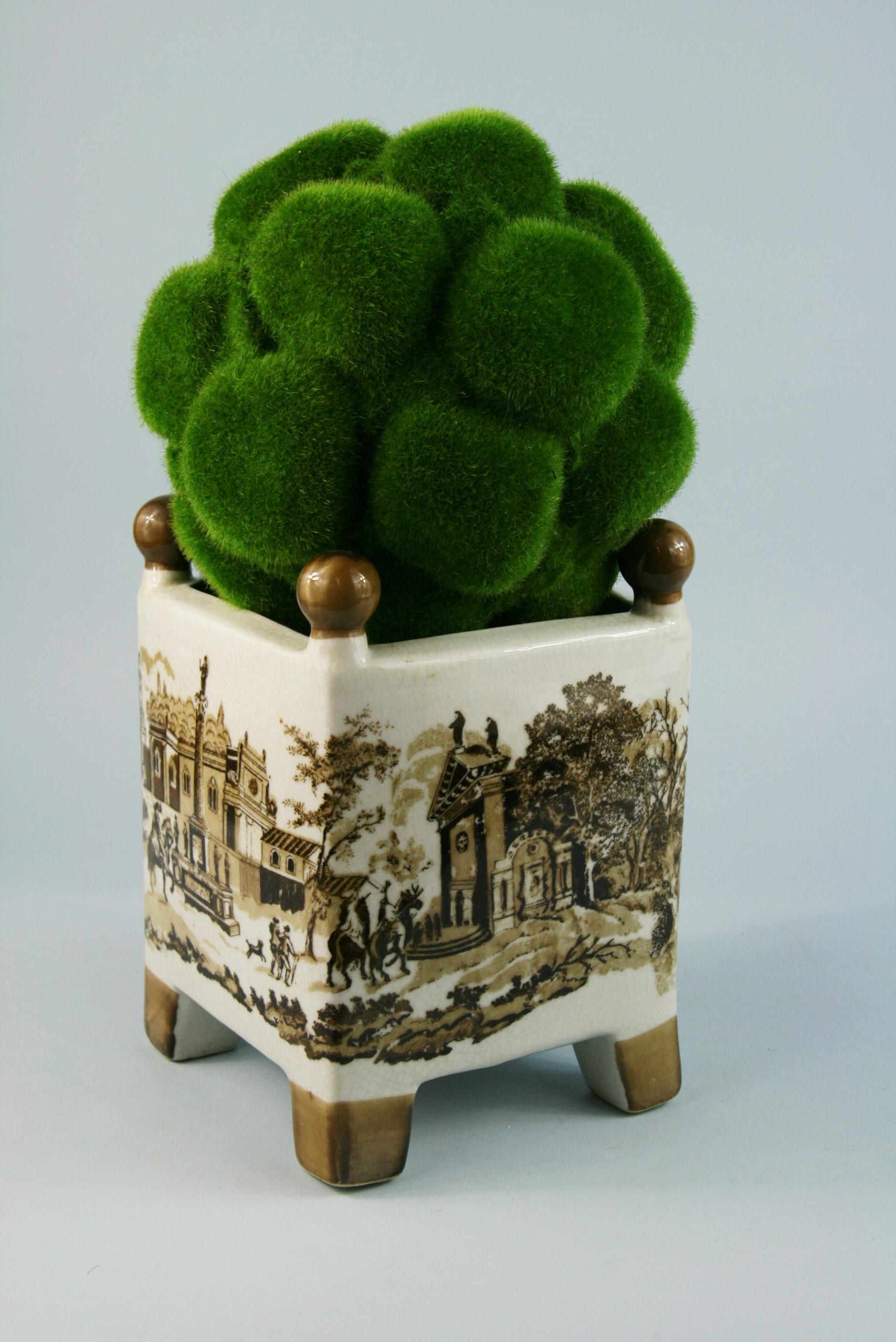 3-496 English stoneware vase with different county scenes on each size with faux topiary.
Can be use as a planter
Planter size: 8 x 8 x 9