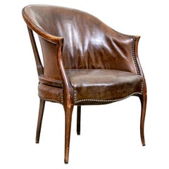 Fauteuil à dossier tubulaire en cuir caramel de style anglais