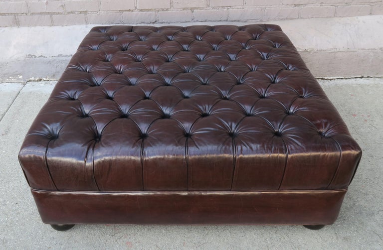 English Style Leather Tufted Ottoman with Bun Feet at 1stDibs