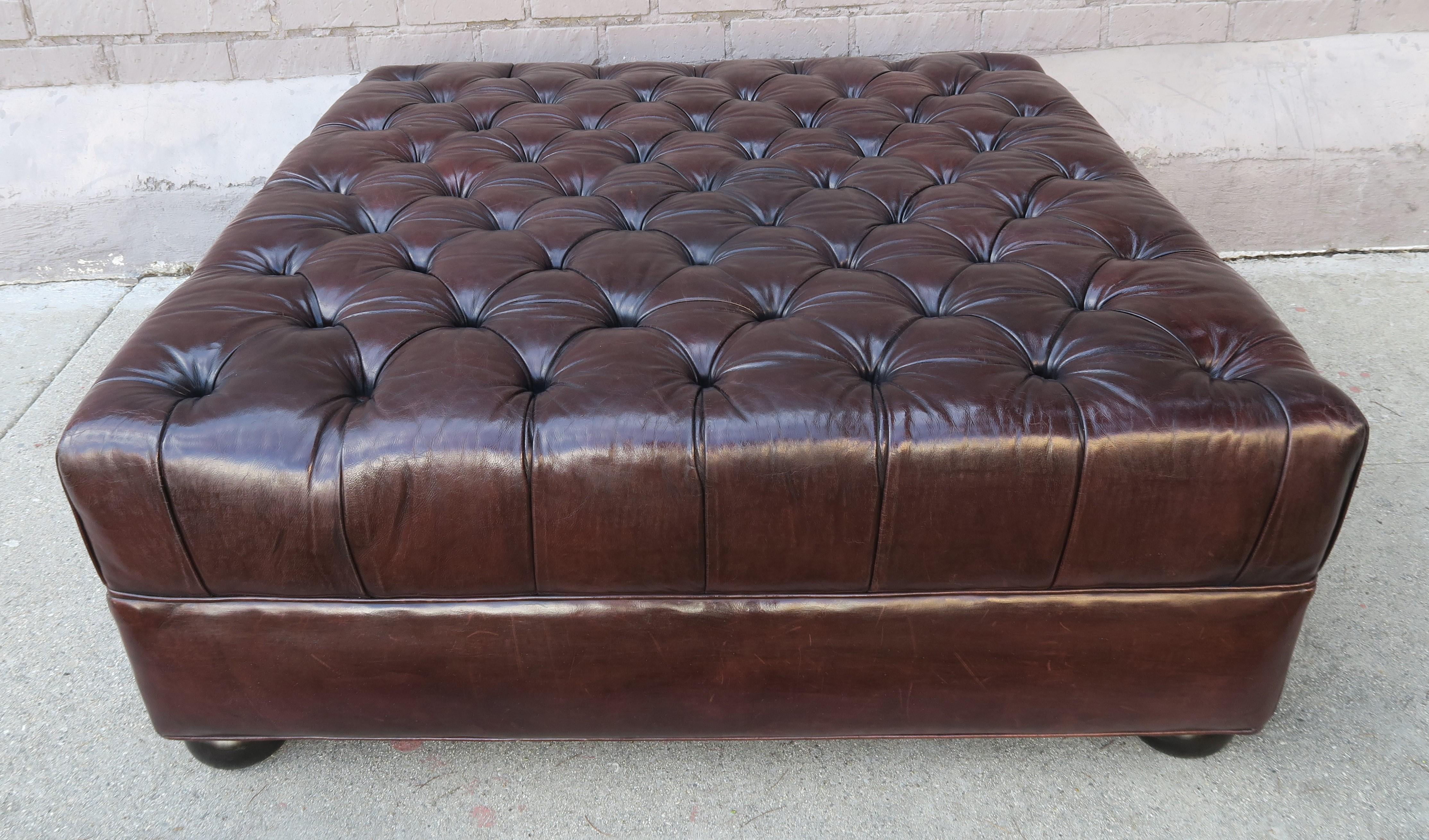 brown leather tufted ottoman