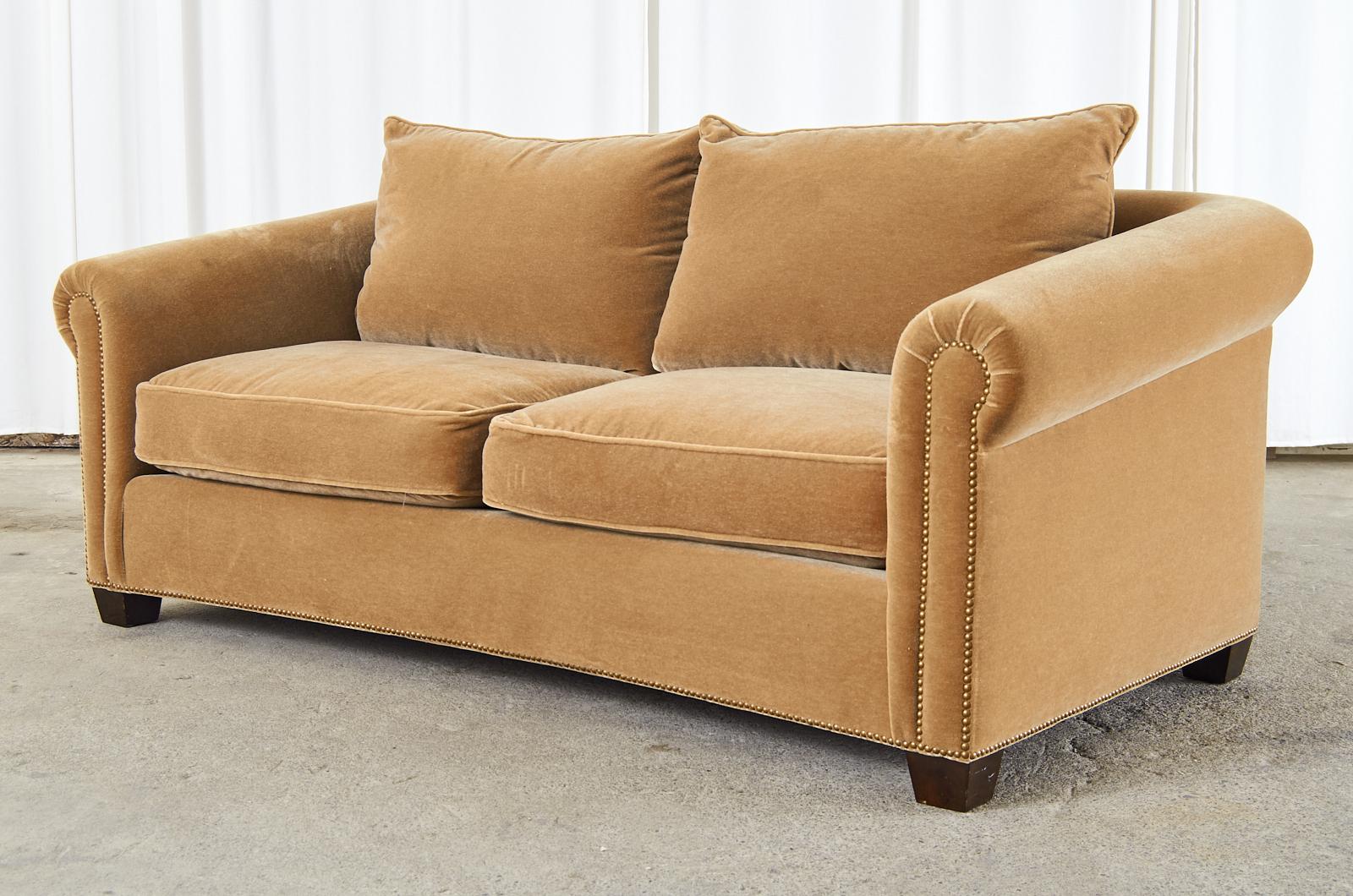 Gorgeous bespoke camel color mohair sofa settee featuring a hardwood frame made in the English style with rolled arms. Bespoke sofa custom ordered from the design center in San Francisco. Fitted with deep seat cushions and back pillows. The front of