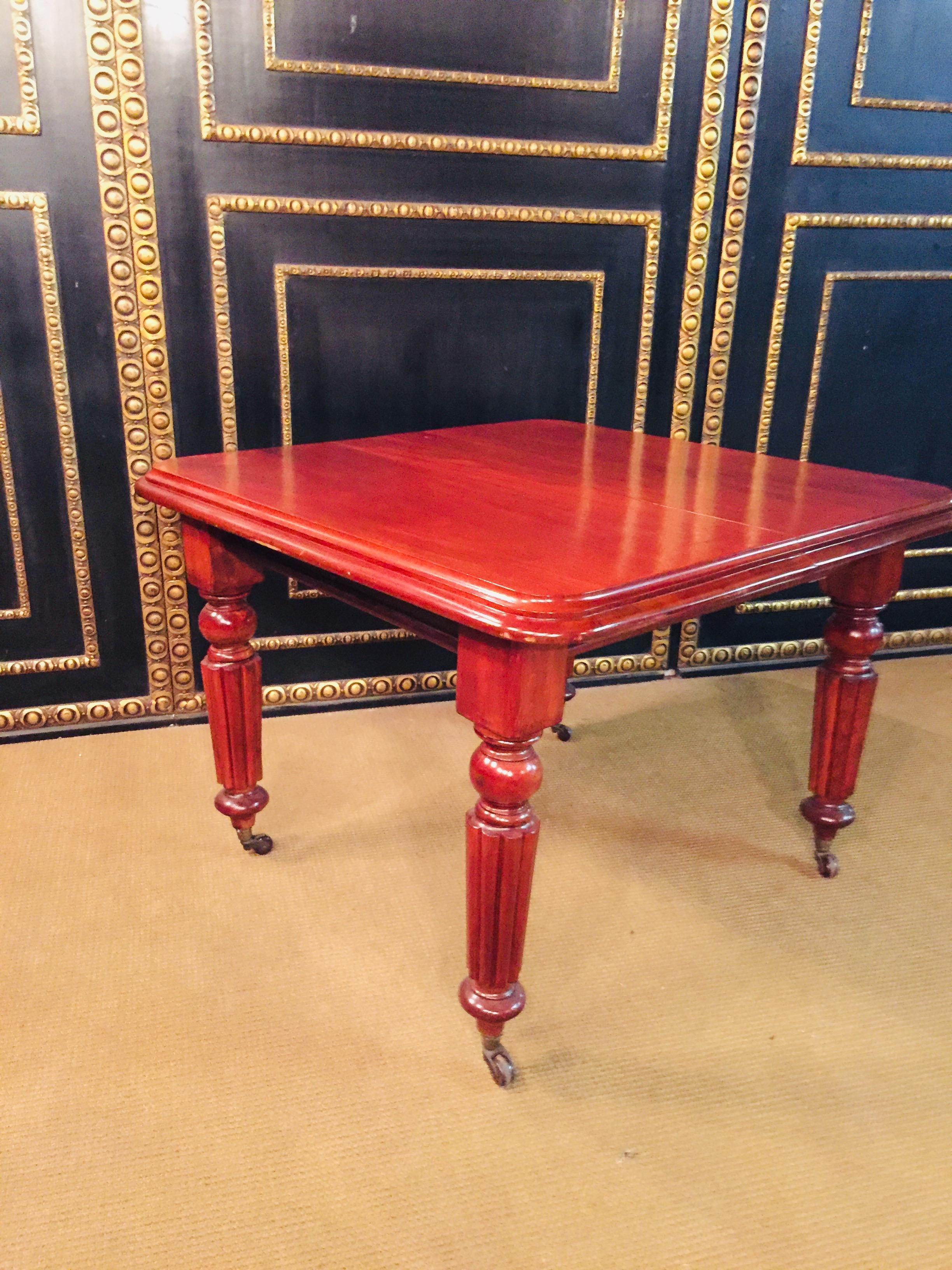 Antique, top quality, solid mahogany English table. Signed Joseph Fitter Tania works cheat Birmingham circa 1850 original casters. Joseph Fitter was one the largest and most successful British furniture retailers and cabinet makers in the Victorian