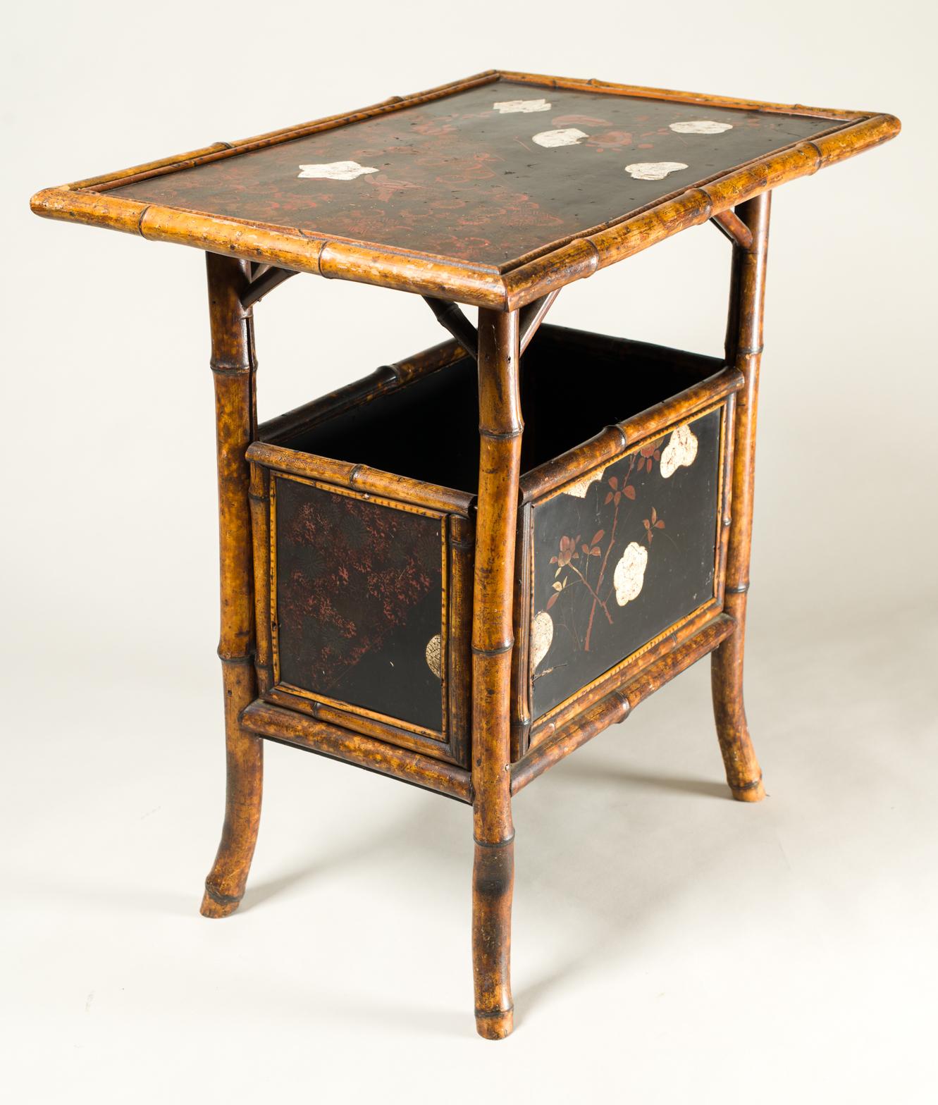 English table with lacquer japanning, eggshell design and bamboo, Japanning is a term used for when Europeans mimic Japanese lacquer by applying a hard, black surface to an item. This table has Japanning on its surfaces with some decorative red