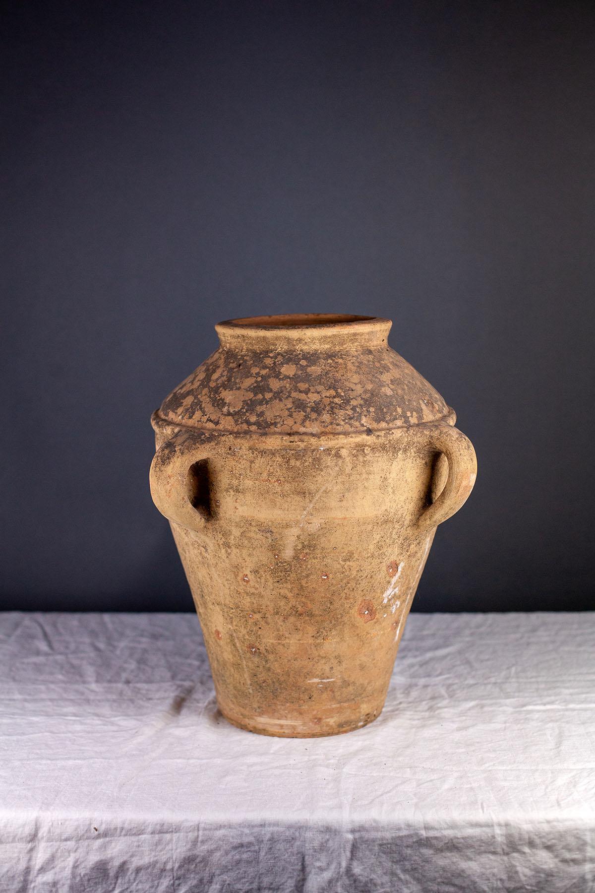 Fleurdetroit presents for your consideration this lovely, English, terra-cotta, vessel with a marvelous patina. Equally as charming in an interior or on an exterior terrace, this vessel has handsome energy and a beautiful surface.