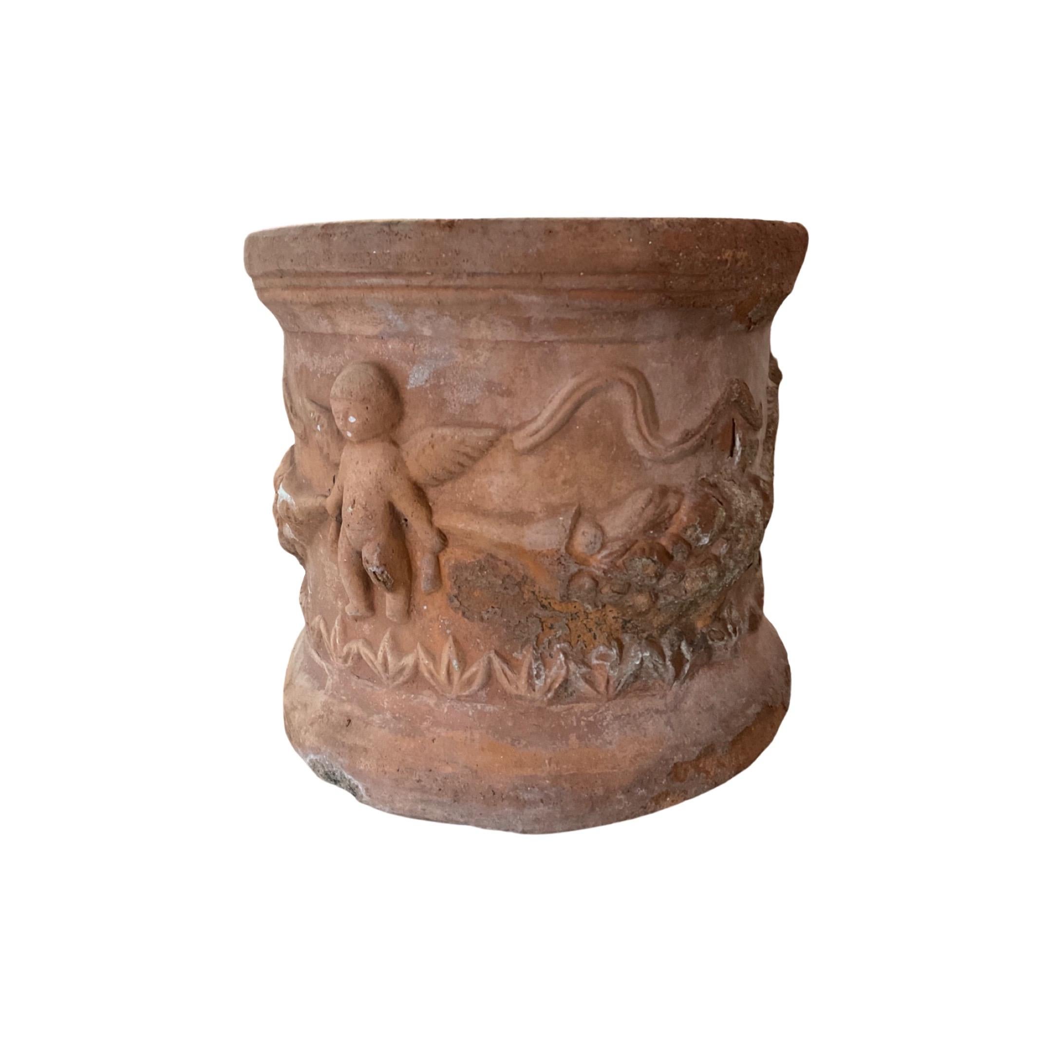 This English terracotta planter set is perfect for adding a touch of classic elegance to your garden. Crafted in the 1880s in England, these planters are made from terracotta giving them a timeless, durable look. Each set includes two planters with