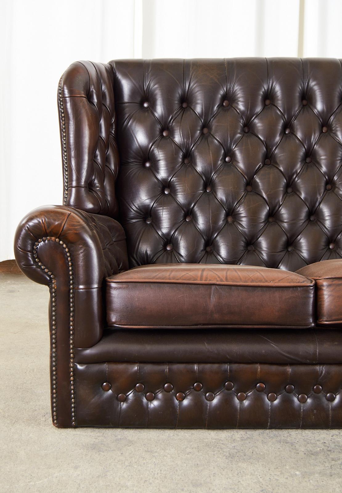 Hand-Crafted English Thomas Lloyd Cigar Leather Wingback Chesterfield Settee For Sale