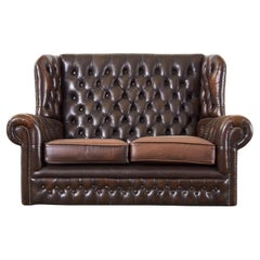 Thomas Lloyd in pelle di sigaro con schienale a chesterfield