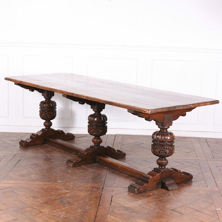 English Three Pedestal Heavily Carved Oak Trestle Table In Good Condition In Vancouver, British Columbia