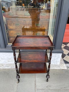 English three tier rosewood trolley with brass accents 19th century