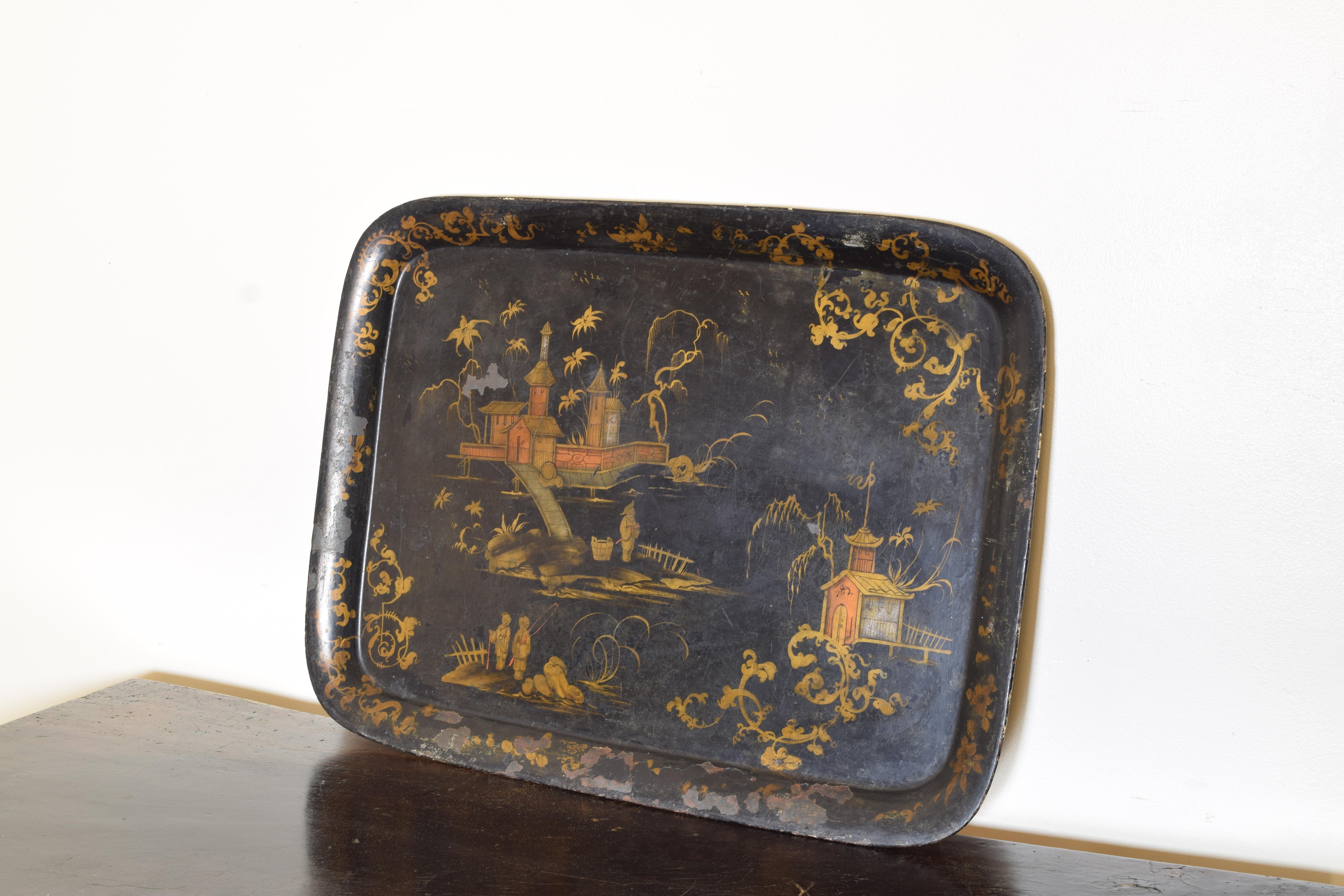 Of rectangular form with rounded corners and a raised edge, painted with chinoiserie decoration