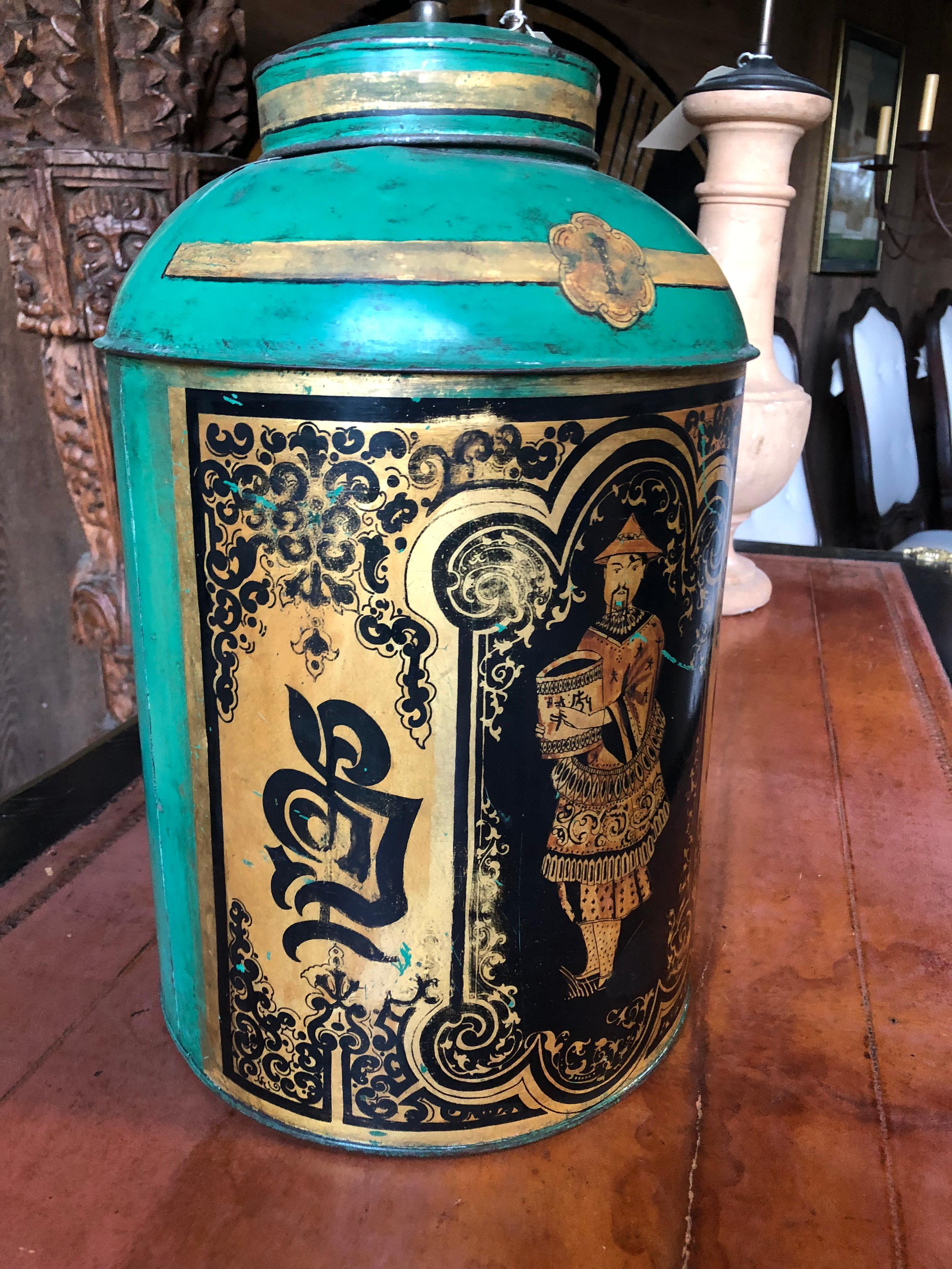 A 19th century English tea can have mounted as a table lamp, the chinoiserie gilt decoration on a green painted ground, circa 1870.
Measures: 28” H to finial.