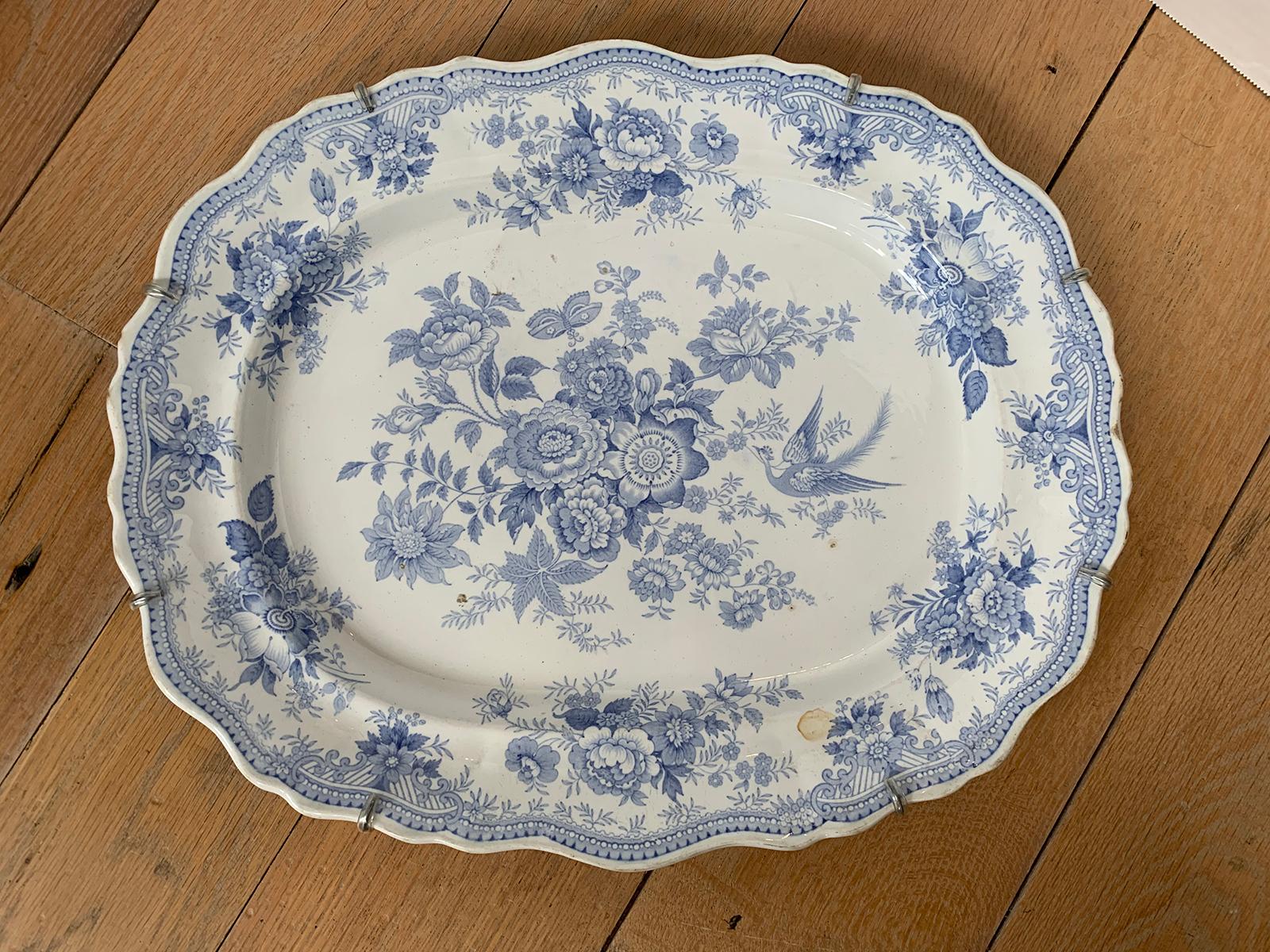Late 19th-early 20th century English blue and white transferware porcelain oval charger in Asiatic Pheasants pattern.