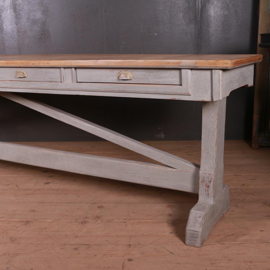 Large English five-drawer trestle table with a good scrubbed and bleached Sycamore top, 1890.

Dimensions:
121.5 inches (309 cms) wide
22 inches (56 cms) deep
30 inches (76 cms) high.