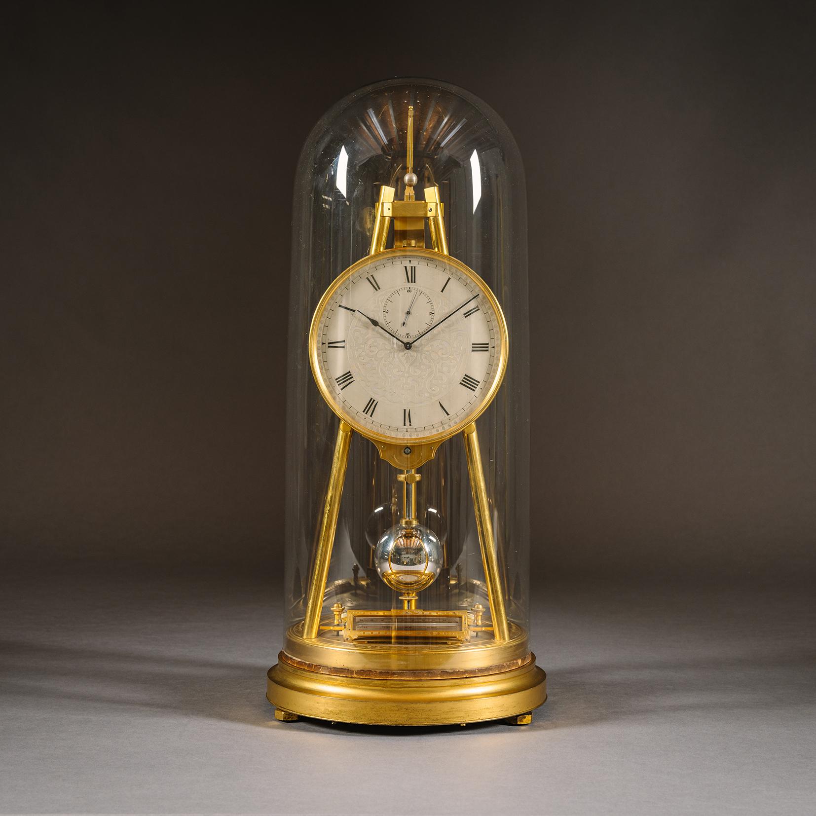 A Fine English Tripod Table Regulator Clock by Thomas Cole, With Integral Thermometer and Barometer, Retailed by Hunt & Roskell, London

Signed to the dial for the retailer ‘Hunt & Roskell, London.’
No. 1318 /38

The circular six-inch silvered dial